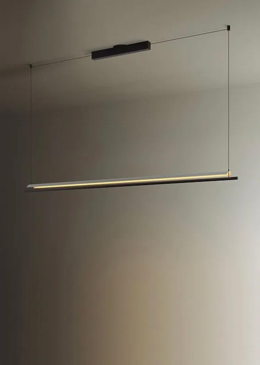 A line of light and a thin metal sheet create a soft but effective levity. A marriage of the poetic and the practical, Lámina is a system that upholds the benefits of reflected light by using obvious shapes in different formats and with different