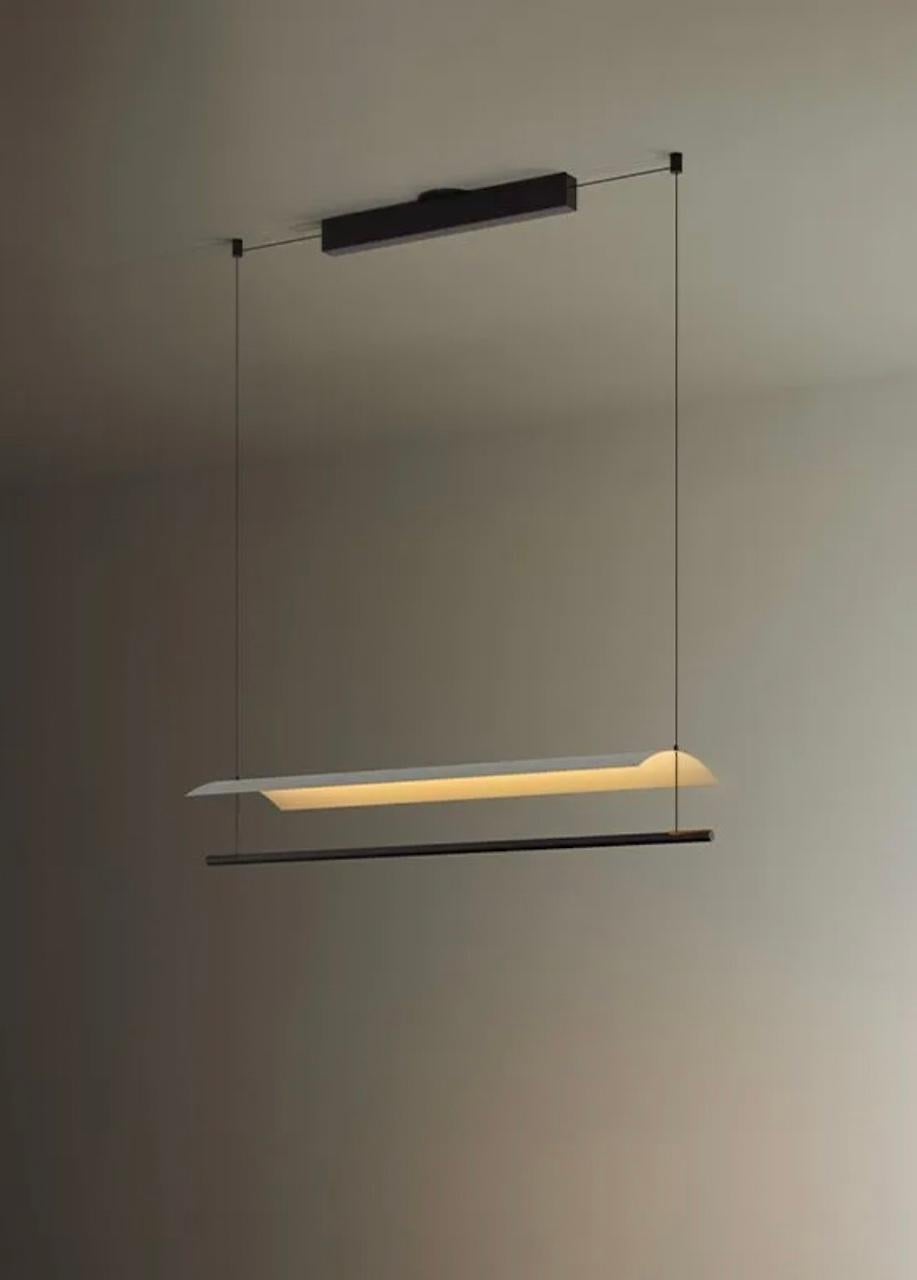 A line of light and a thin metal sheet create a soft but effective levity. A marriage of the poetic and the practical, Lámina is a system that upholds the benefits of reflected light by using obvious shapes in different formats and with different