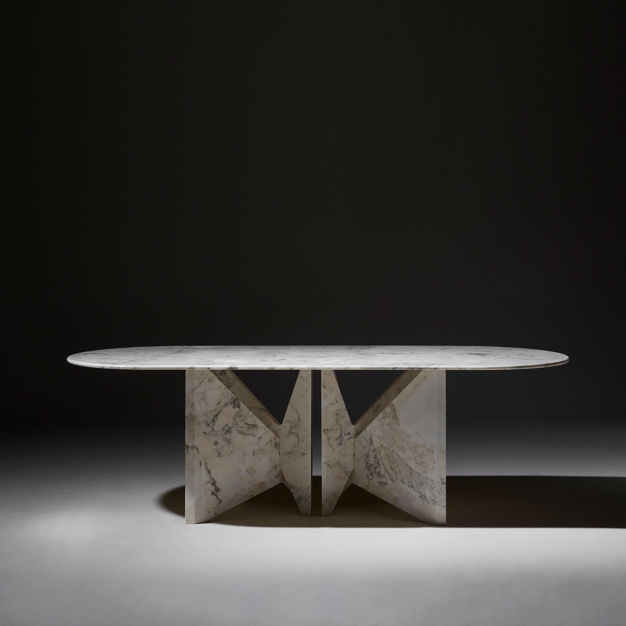 Lamina marble dining table, Hannes Peer
Dimensions: 110 W x 250 D x 76.5 H cm
Materials: Veined Estremoz Marble

Lamina is a dinner table relying on the intersection of marble slabs. The interlocking triangle shaped legs give it both a sense of