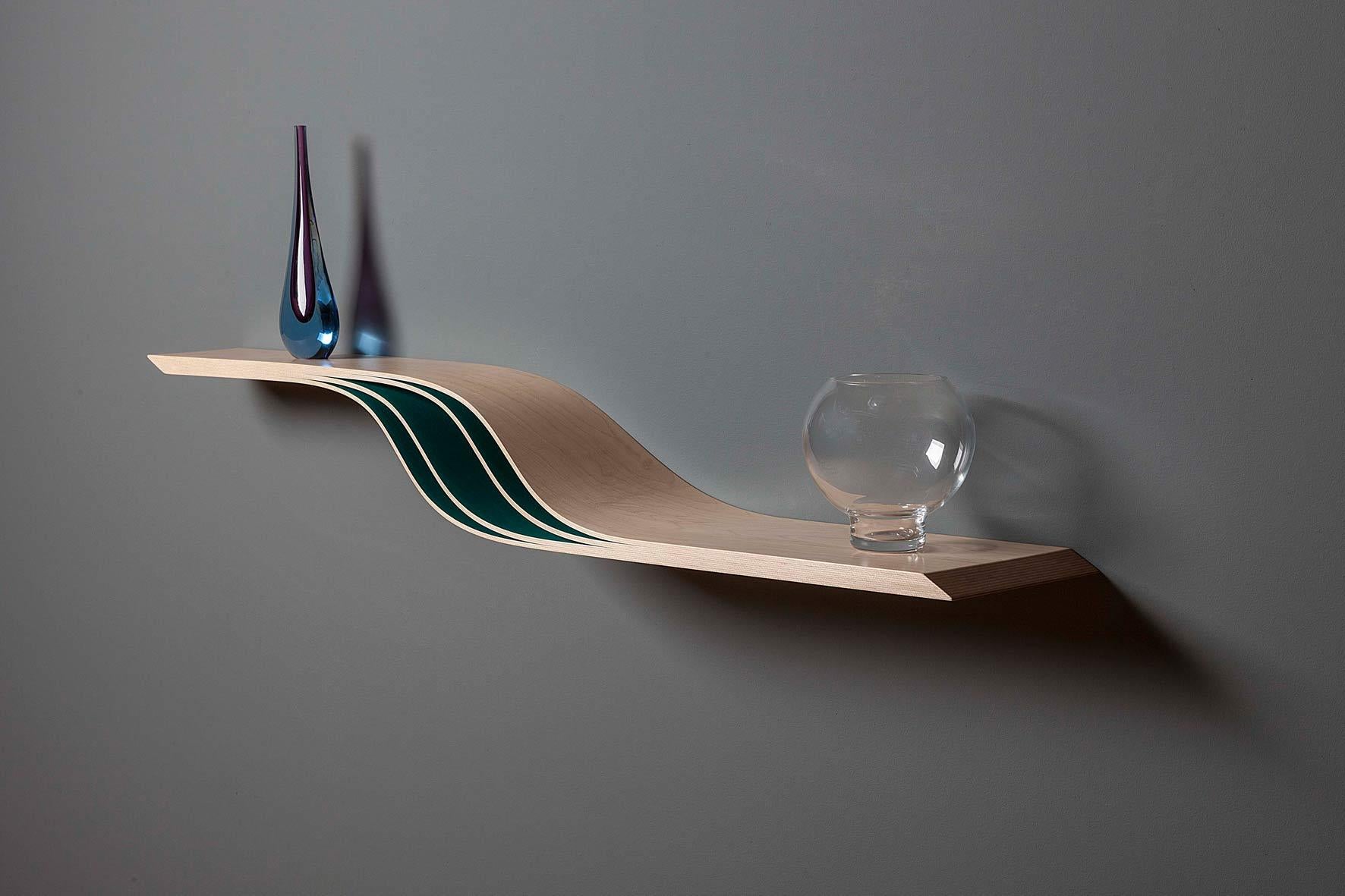 Laminated Maple Vitulus Floating Shelf by David Tragen
Dimensions:  W 110 x D 20 x H 14 cm
Materials: Maple (Laminated), Painted.
Weight: 2 kg.

About: He left university with a degree in International Business in 1994, but had already developed a