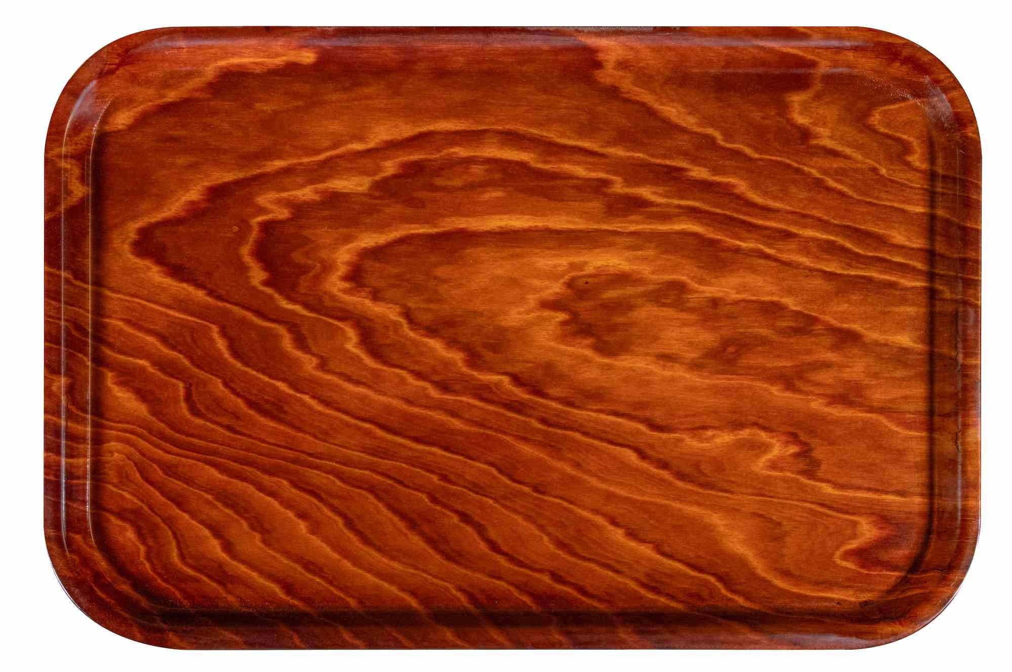 Laminated Vintage Tray is a decorative object realized in the half of 20th century by Gerling Sol-Ohligs.

A very elegant wood laminated tray realized by the brand Gerling Sol-Ohligs (as reported on the base). 

A unique item to be collect.



