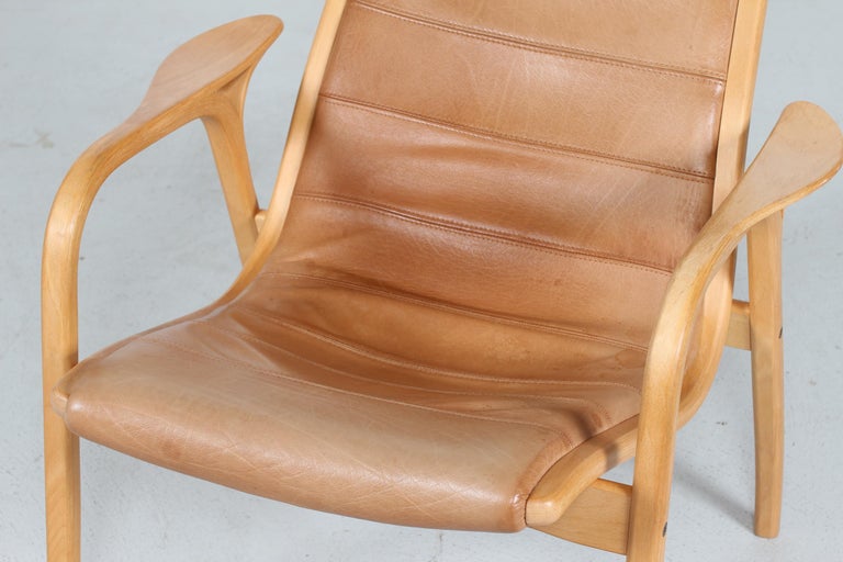Late 20th Century Lamino Chair by Yngve Ekström with Cognac Colored Leather Made by Swedese Sweden For Sale