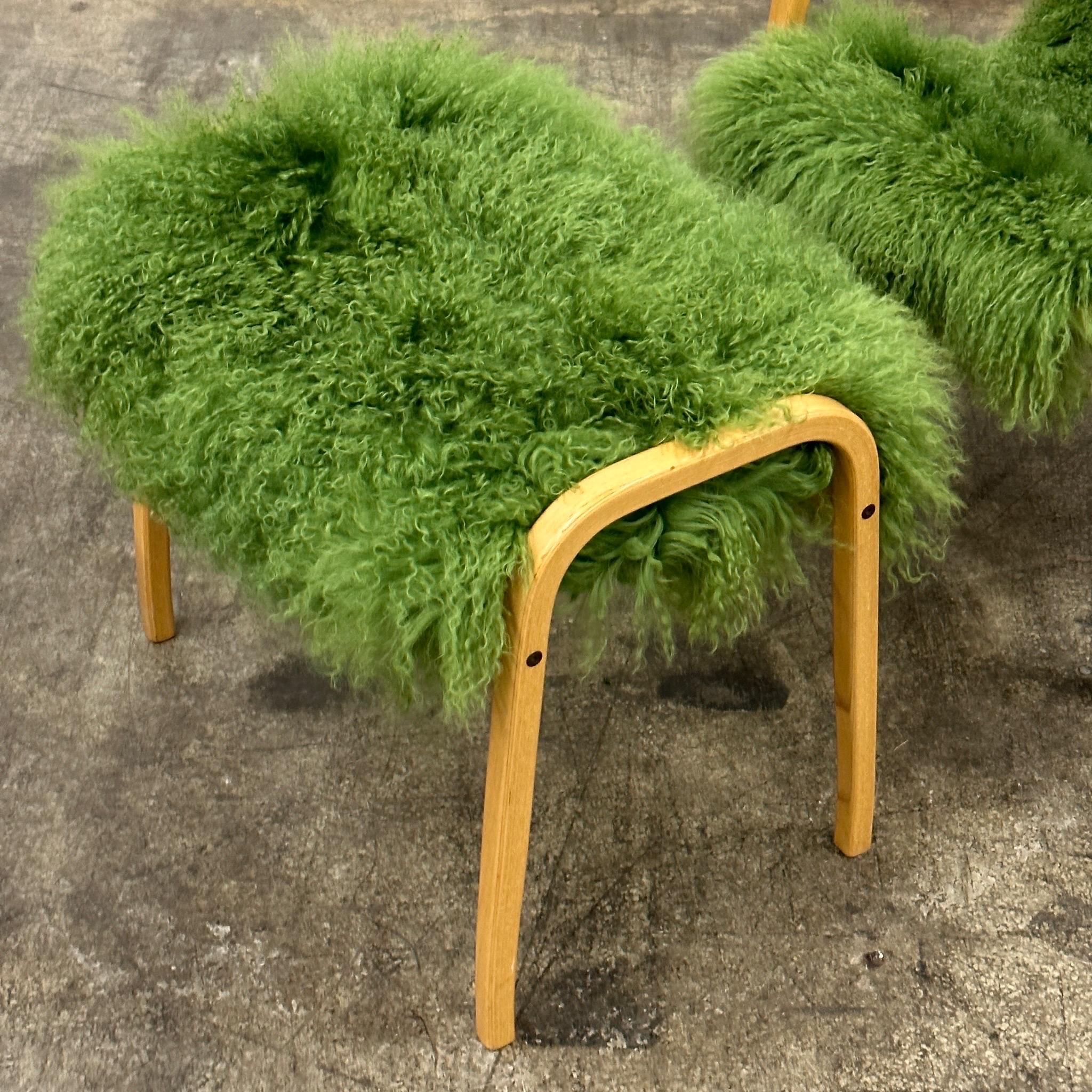 c. 1970s. Made in Sweden. Reupholstered in green dyed Mongolian curly lamb fur. Full beech wood frame. 