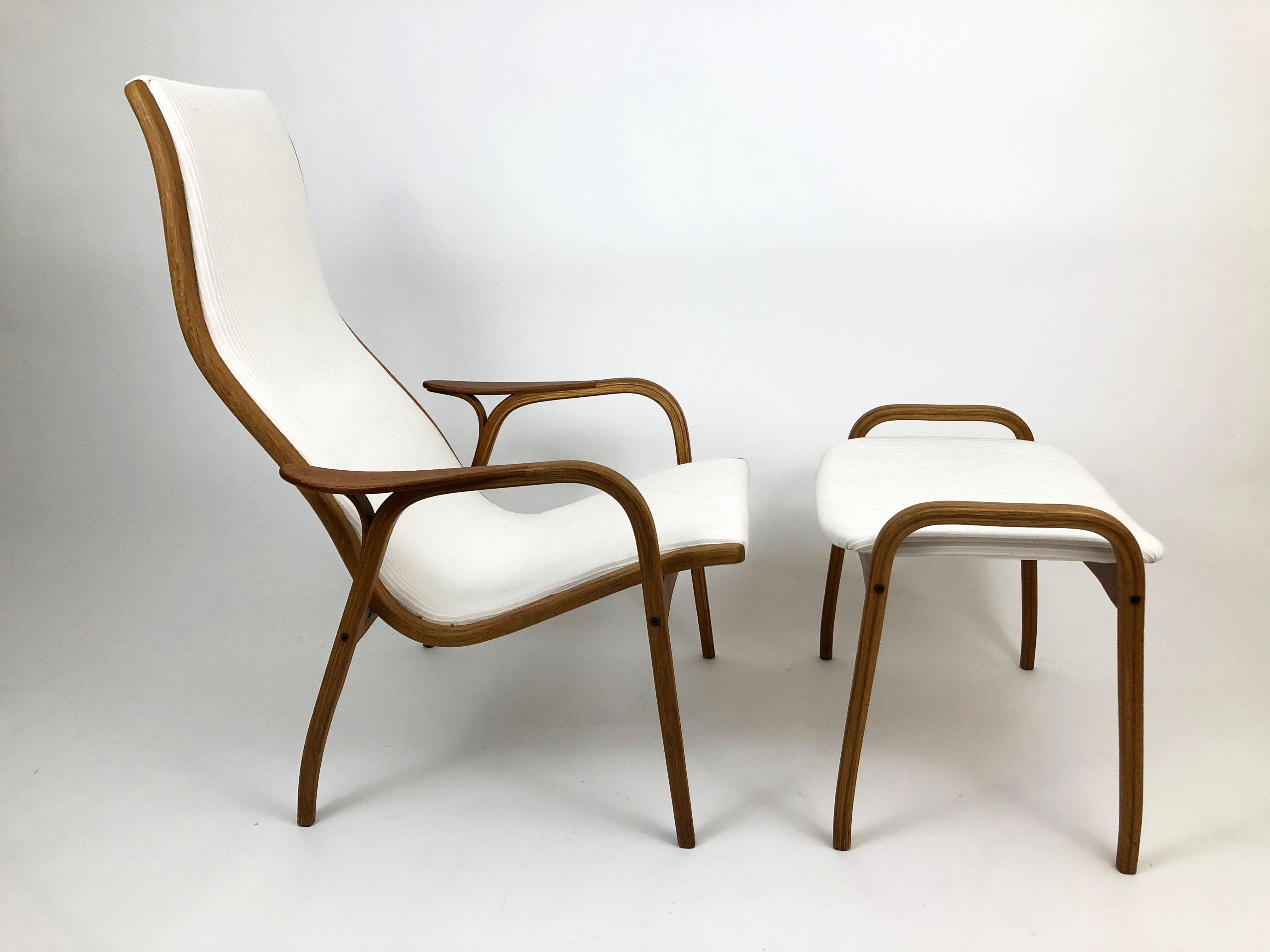 A 'Lamino' lounge chair and ottoman by Yngve Ekstrom for Swedese Mobler.

Measures: Seat height
16.0 inches 

Ottoman dimensions: 23.5