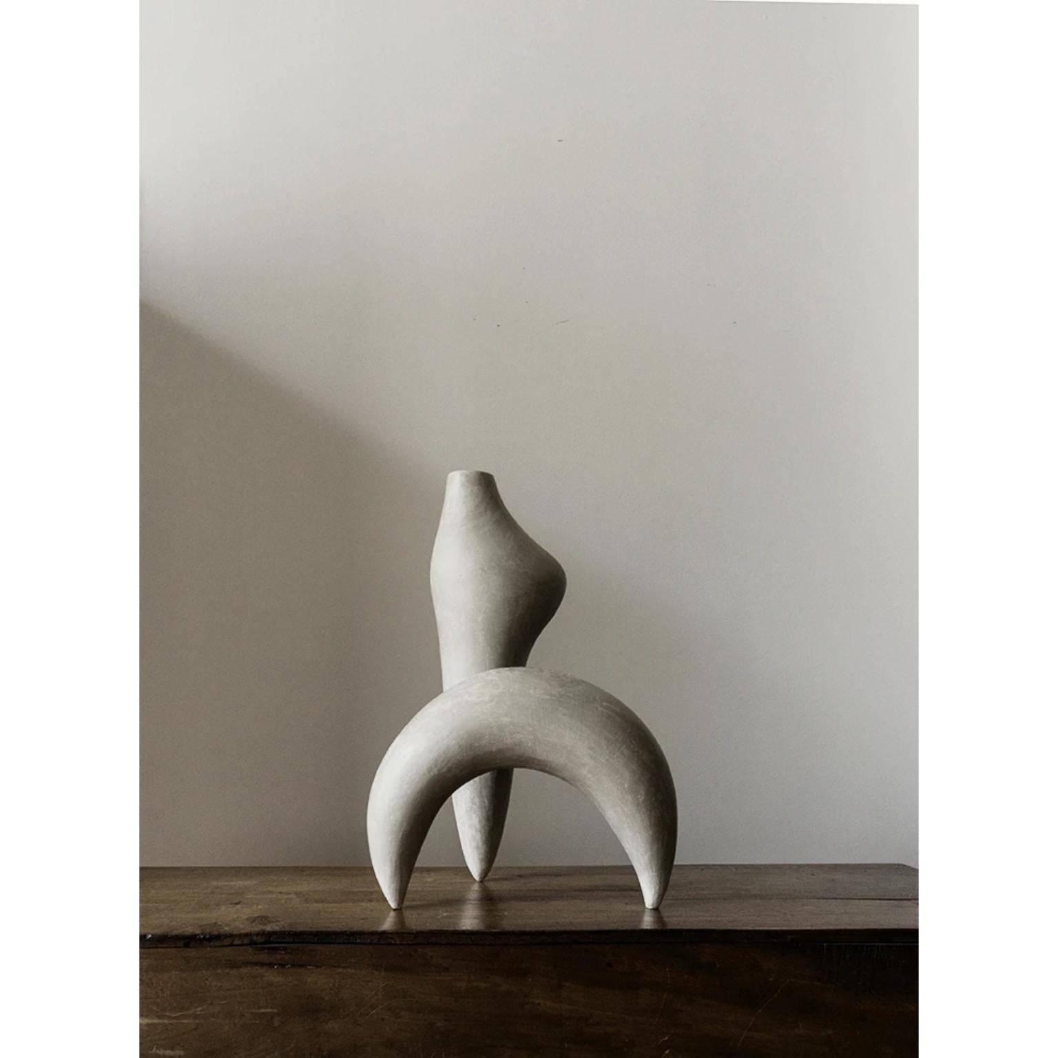 Lamium vase by Cosmin Florea.
Unique piece.
Dimensions: W 33 x D 30 x H 50 cm.
Materials: Stoneware.

Inspired by my love for pristine nature, this sculptural vase channels the shape of a dove.
Handcrafted in white stoneware, the Dove vase can