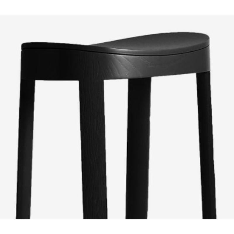 Lammi bar stool, 66 cm, black by Made By Choice with Saku Sysiö
Dimensions: 47 x 38 x 66 cm
Materials: Oak
Standard finishes: natural wood / painted black

Also available: Lammi bar stool tall (74cm) & custom colors on request.

Saku Sysiö