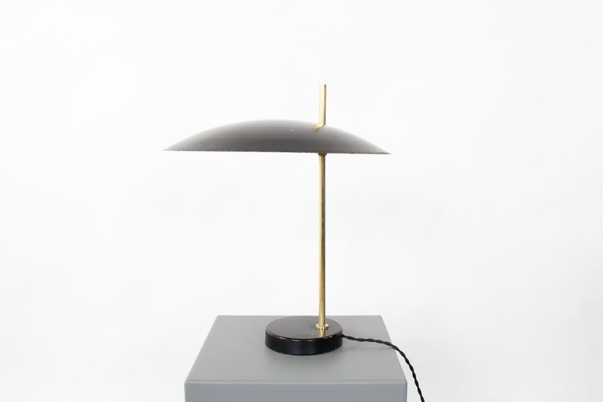 Lamp designed by Pierre Guariche for Disderot in the fifties
1013 model
circular base in black lacquered metal, vertical arm in brass, round black metal lampshade
Iconic model
Switch on the socket ( proof of authenticity)
