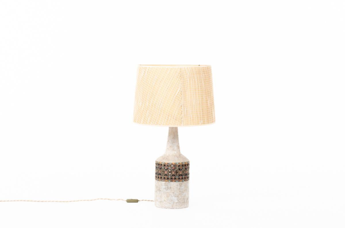 Table lamp made by artist Raphaël Giarrusso in the 1960s
Base in ceramic with 2 bulbs (inside and on the top)
Lampshade from origin.