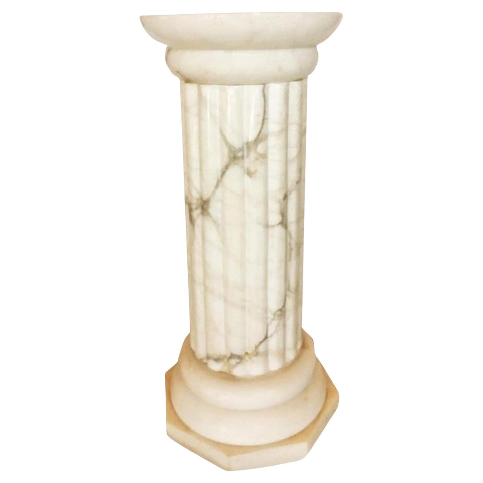 Flor Lamp / Pedestal 
Alabaster very well preserved, without stains or color changes
 
Flor Lamp Pedestal illuminated  Alabaster Marble White Greek Colunm Form, Italy

Italian white alabaster carved floor lamp with interior lighting
mid-20th