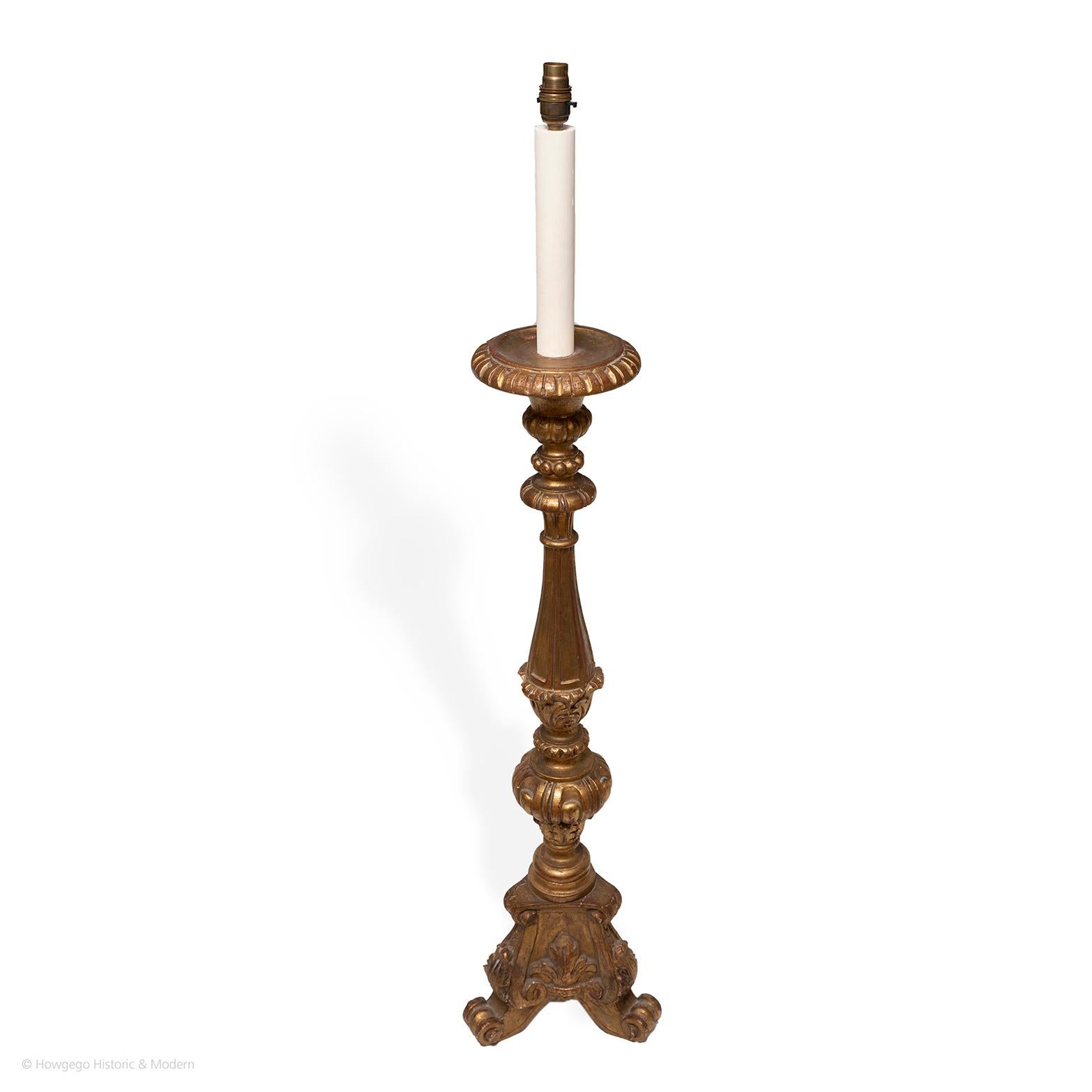 Fine, 19th century, italian, carved & gilded pricket torchere upcycled into a floor standing lamp.
Finely carved with classical turnings and ornamentation, the gilding burnished to enhance the reflection of candlelight 
Injects classical gravitas