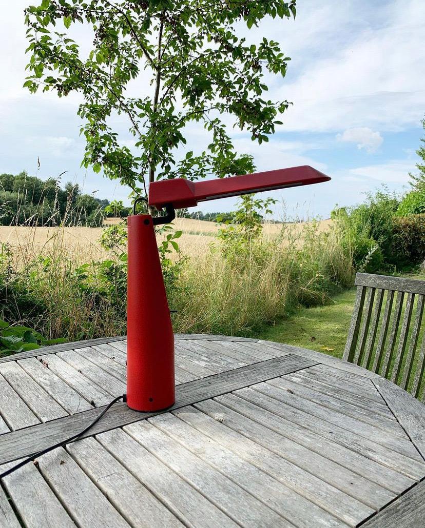 Such a cool table lamp /Office lamp from the 1980s. Designed by the japanese designer Isao Hosoe and produced by Luxo Italiana in 1984. ‘Picchio’ is the name of the lamp. 
The top of the lamp is adjustable and the on/off buttom has two levels.