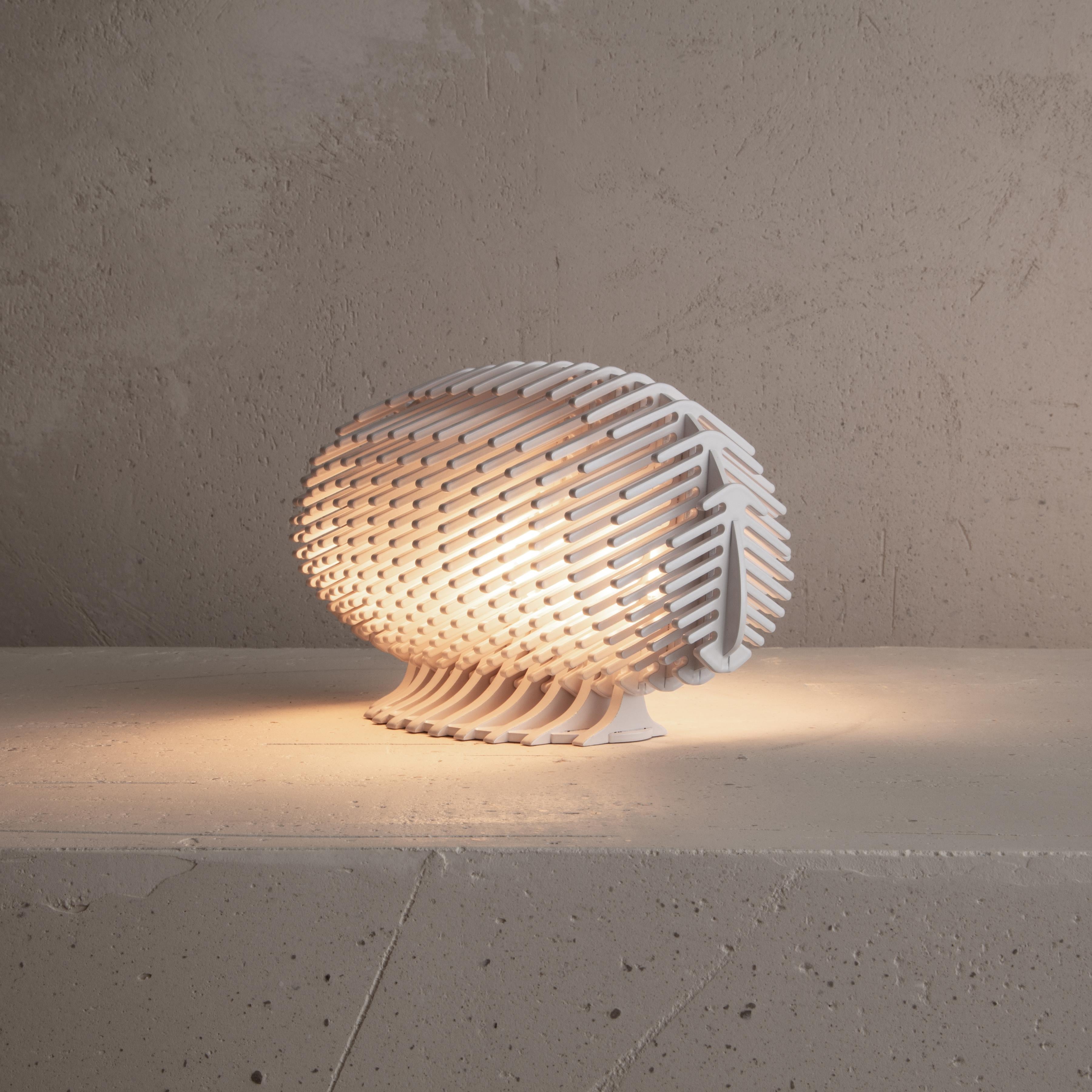 A small, sculptural light source, the lamp H - for hedgehog - may repose on its base whether on flat surface or on the wall.

Dreyfus’s latest “Objets de Lumière” (Objects of Light) expand on the artist’s significant body of work and his
