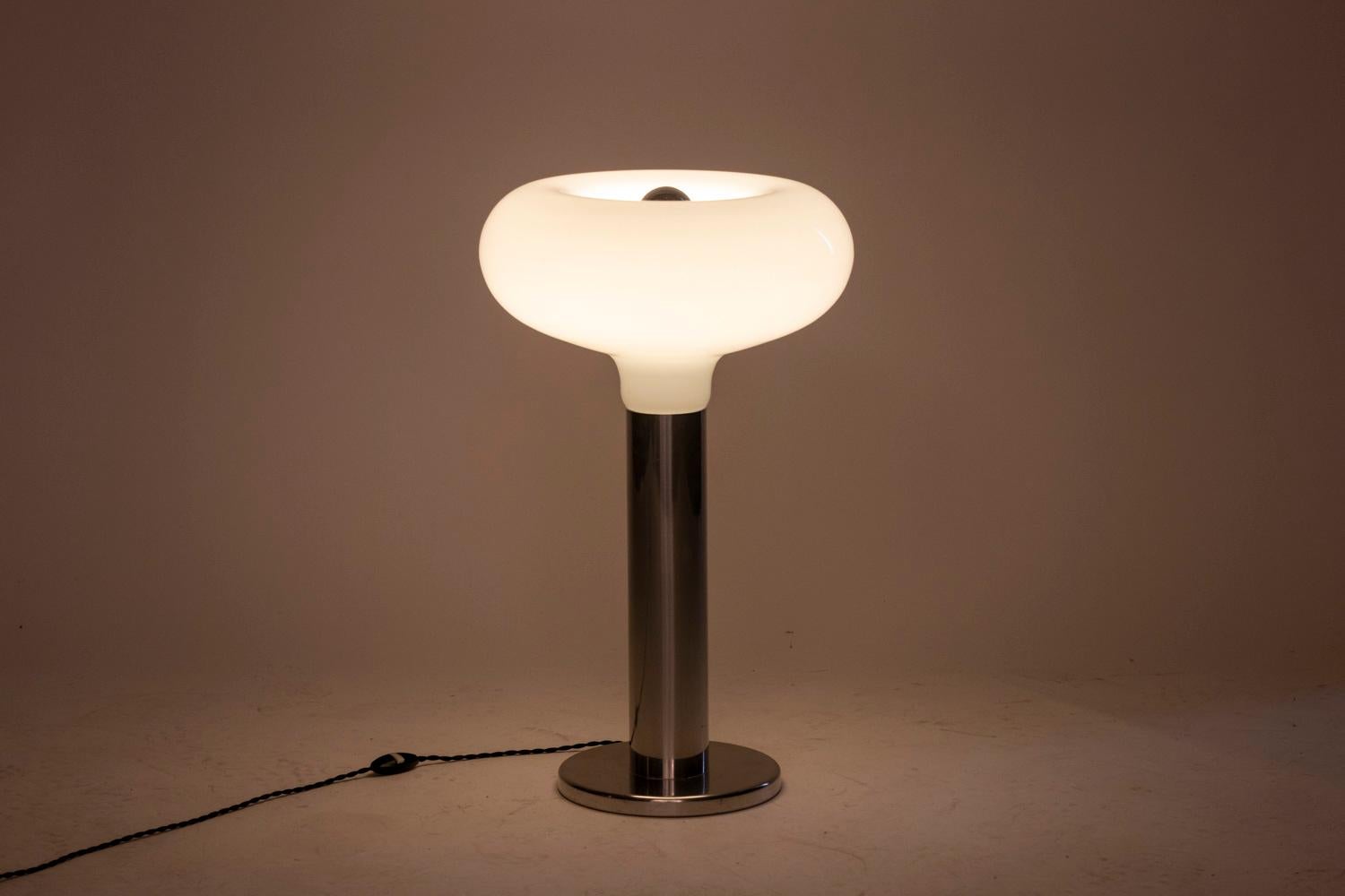 Circular shaped lamp. Base in polished aluminum and white opaline.

Italian work realized in the 1970s.

New and functional electrical system.