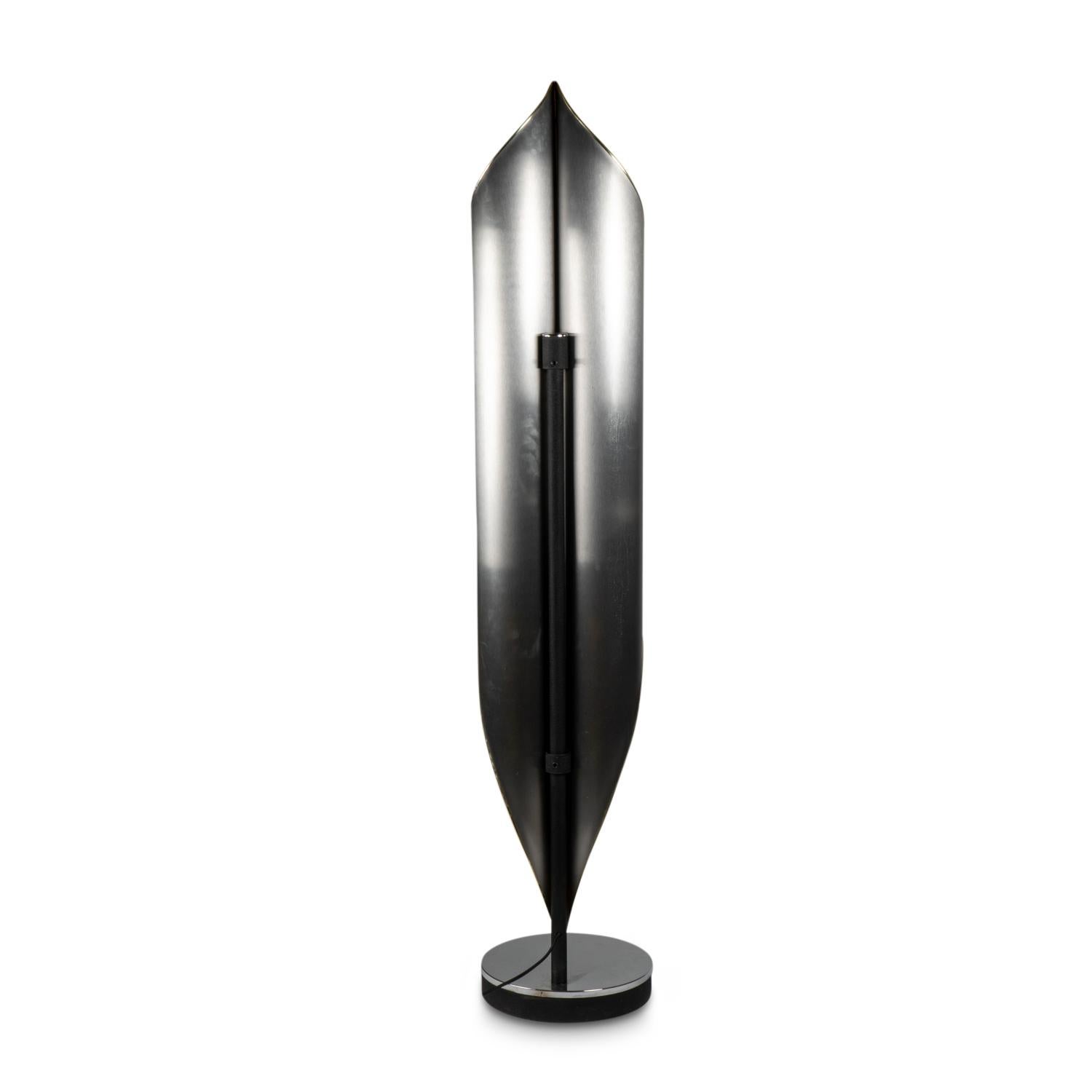 Lamp in polished and brushed metal, suggesting a manta ray. 
Italian work made in the 1970s. 
