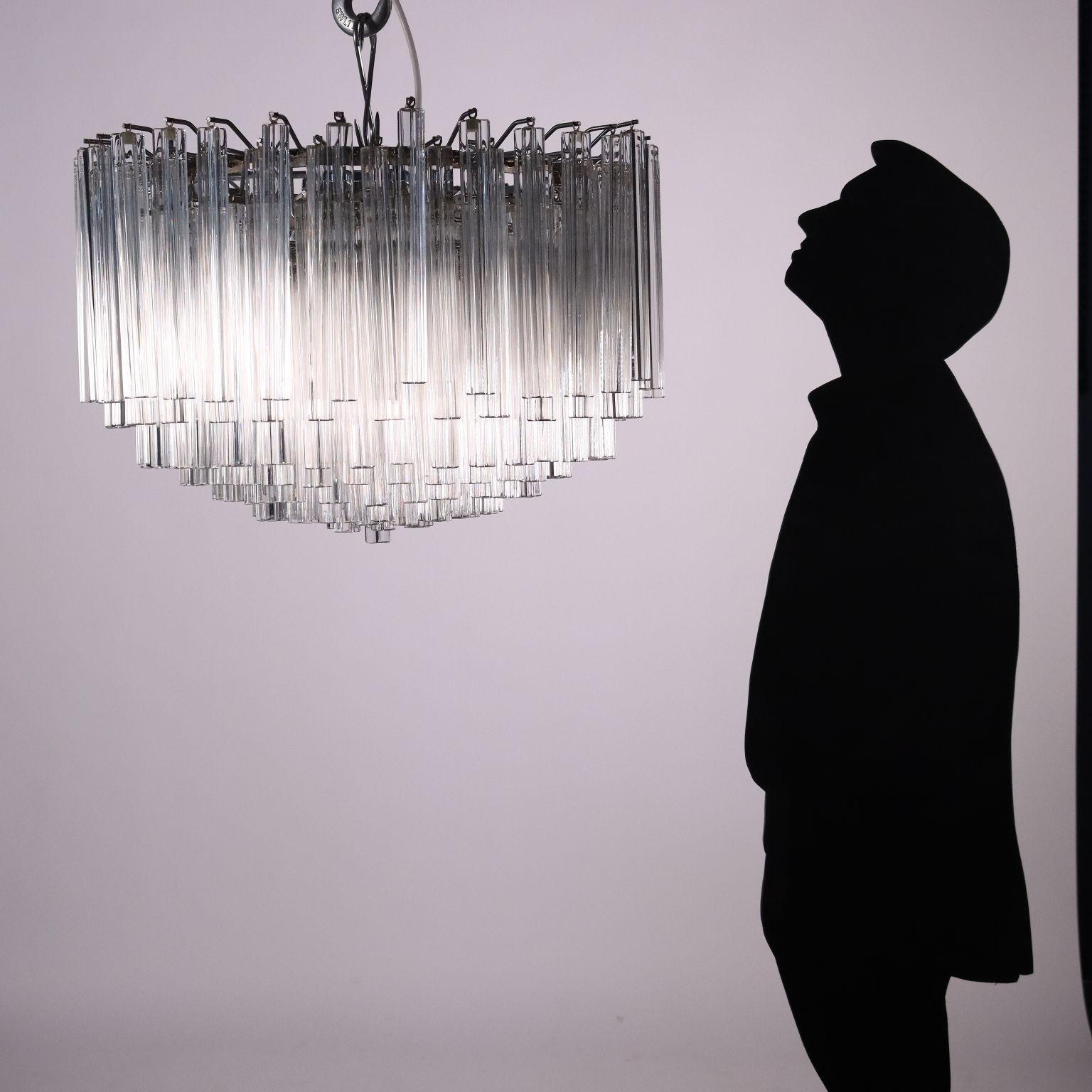 Ceiling lamp with metal structure and glass pendants in the shape of a 