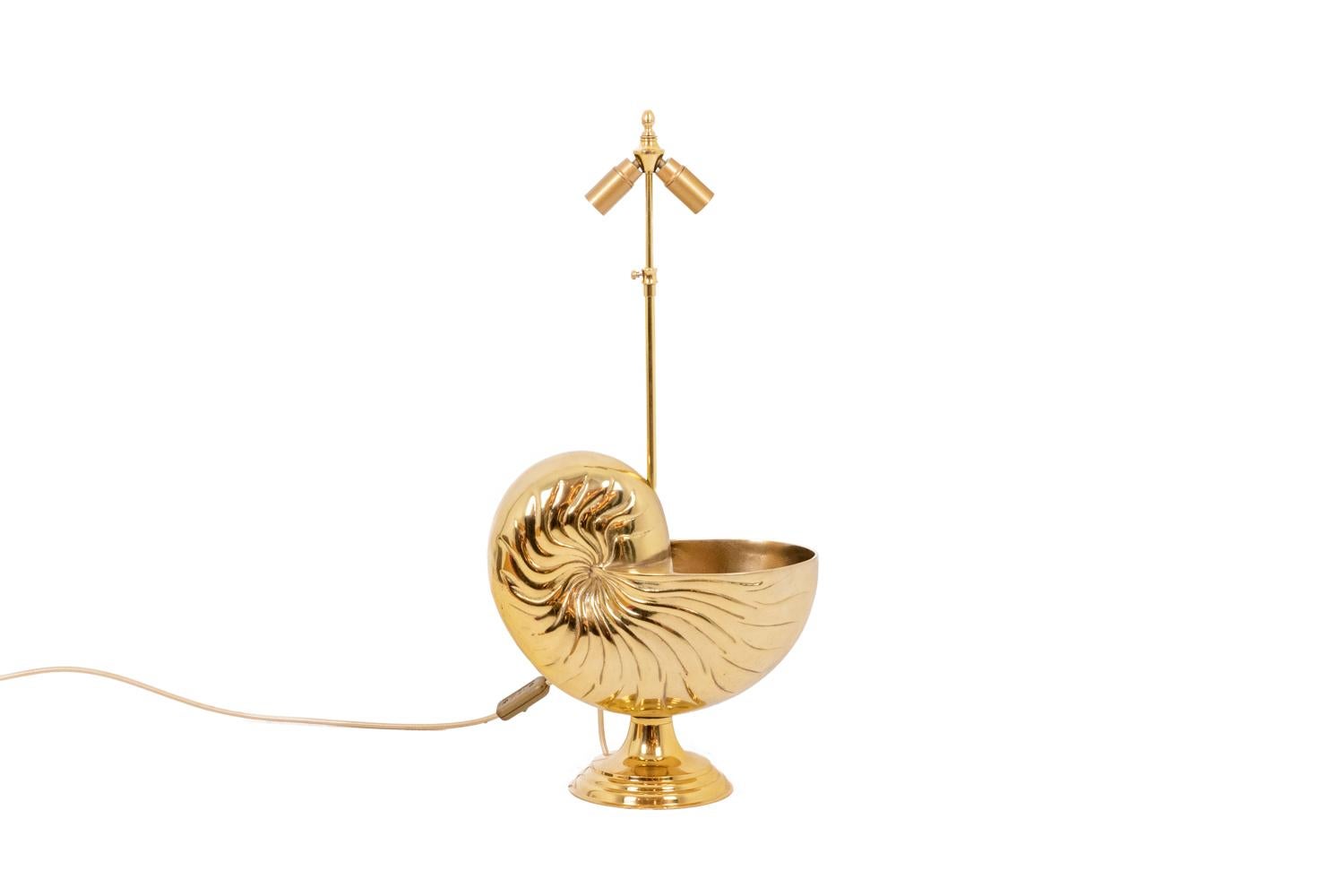 Lamp in gilt bronze representing a Nautilus.

French work realized in the 1970s.

!The price doesn’t include the lampshade price. However, our workshop can advise you with pleasure and realize it with your size and color choices!

 