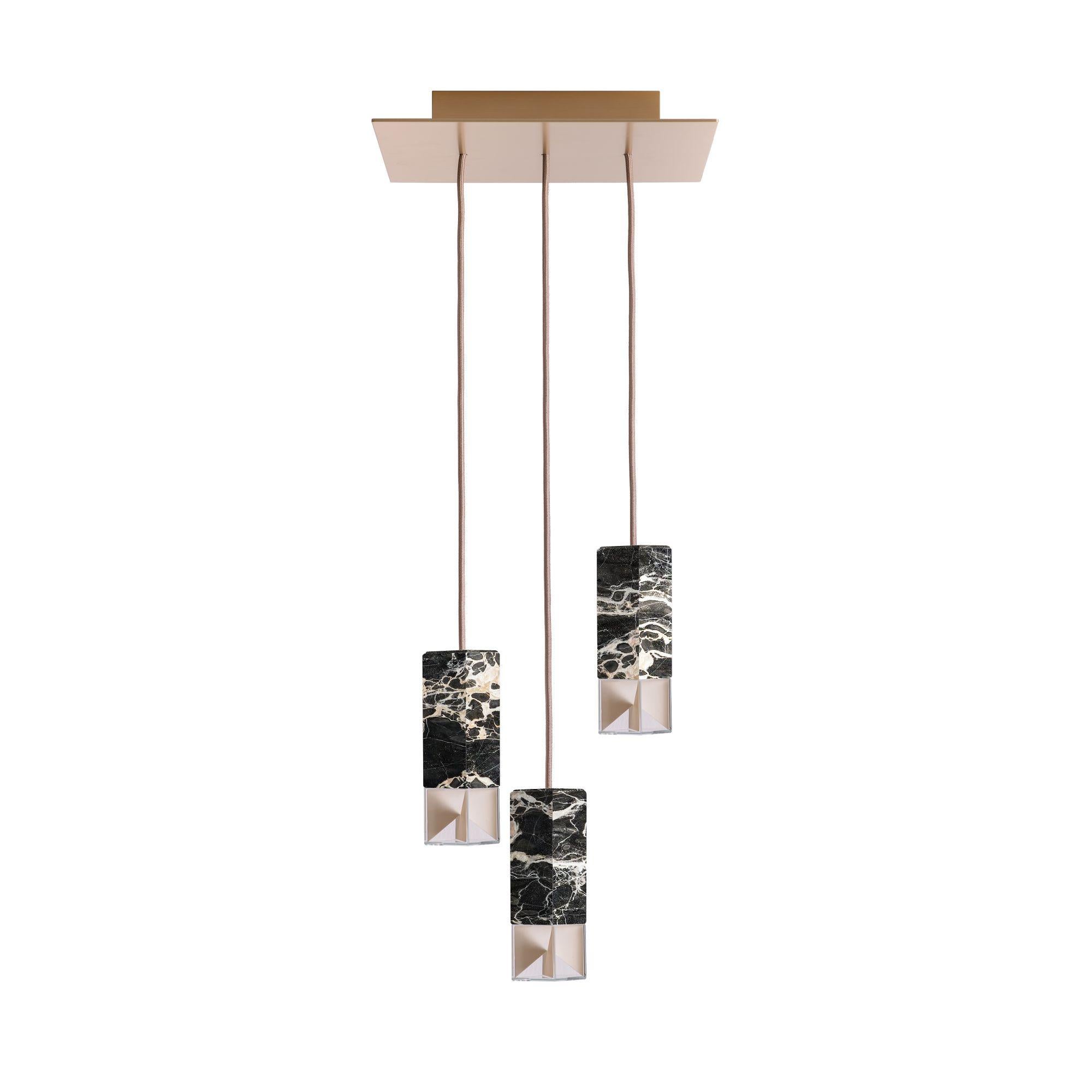 Lamp one 6-light chandelier in black marble by Formaminima
Dimensions: H 93 x 30 x 30 cm
Materials: Marble

Ultra-thin anti-reflection crystal diffuser
Inside-diffuser Limoges biscuit-finish porcelain sheets
Satin brass ceiling rose H 30 300 x