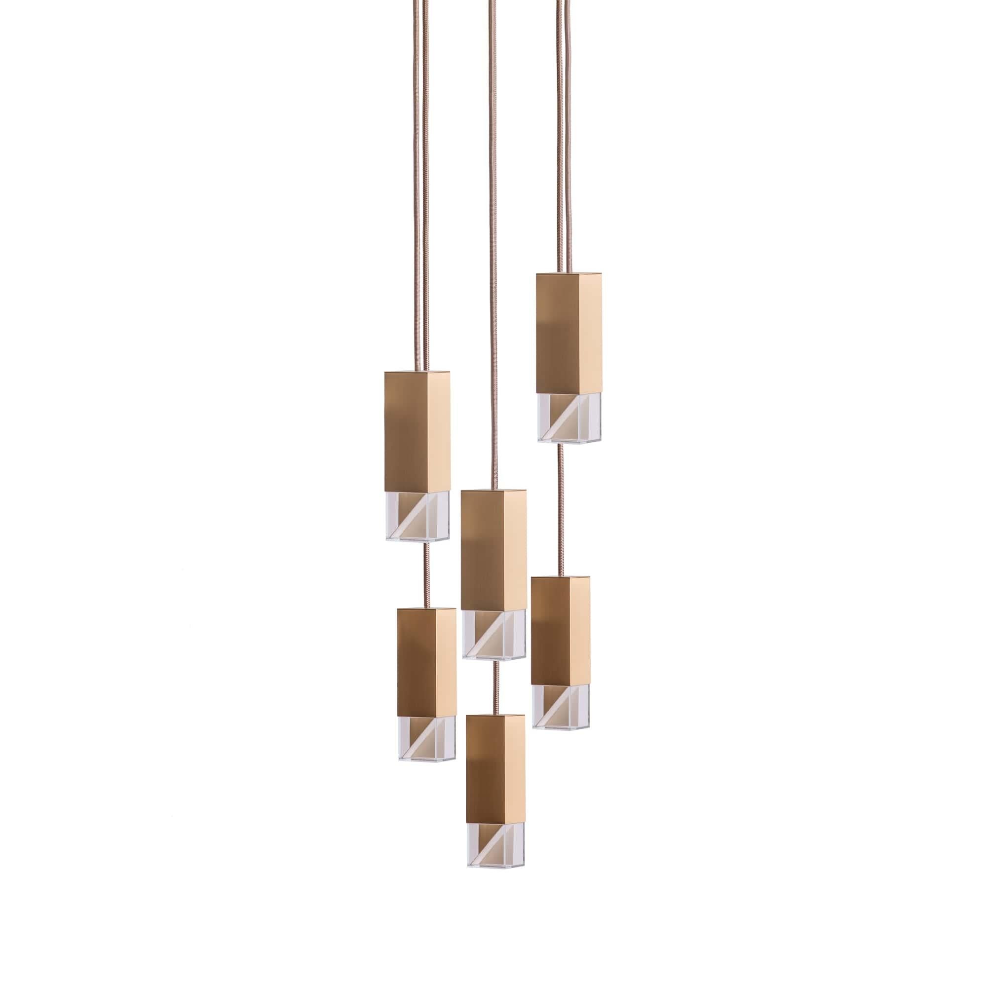 Lamp one 6-light chandelier in nrass by Formaminima
Dimensions: H 93 x 30 x 30 cm
Materials: Lamp body in solid brass, satin finish

Ultra-thin anti-reflection crystal diffuser
Inside-diffuser Limoges biscuit-finish porcelain sheets
Satin