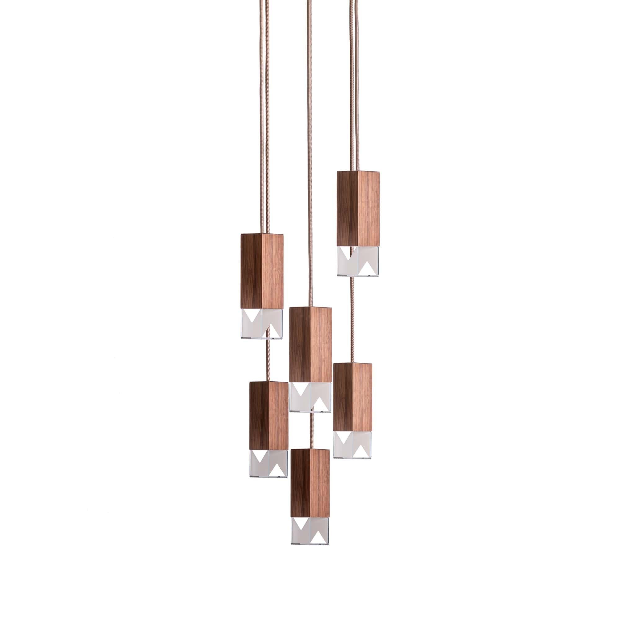 Lamp one 6-light chandelier in walnut by Formaminima
Dimensions: H 93 x 30 x 30 cm
Materials: lamp body in marble

Ultra-thin anti-reflection crystal diffuser
Inside-diffuser Limoges biscuit-finish porcelain sheets
Satin brass ceiling rose h
