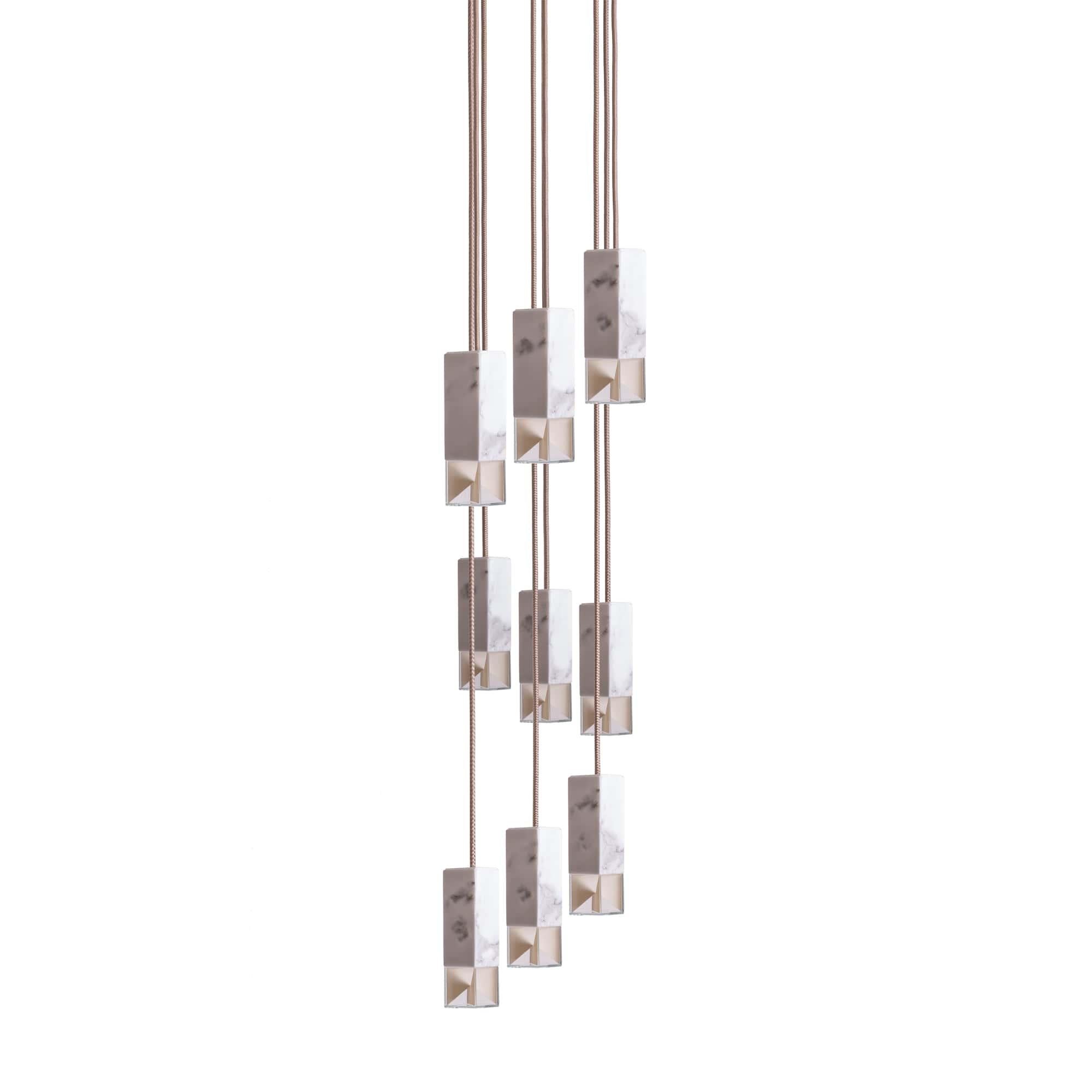 Lamp one 9-light chandelier in marble by Formaminima
Dimensions: H 111.9 x 30 x 30 cm
Materials: Lamp body in solid brass, satin finish

Ultra-thin anti-reflection crystal diffuser
Inside-diffuser Limoges biscuit-finish porcelain sheets
Satin