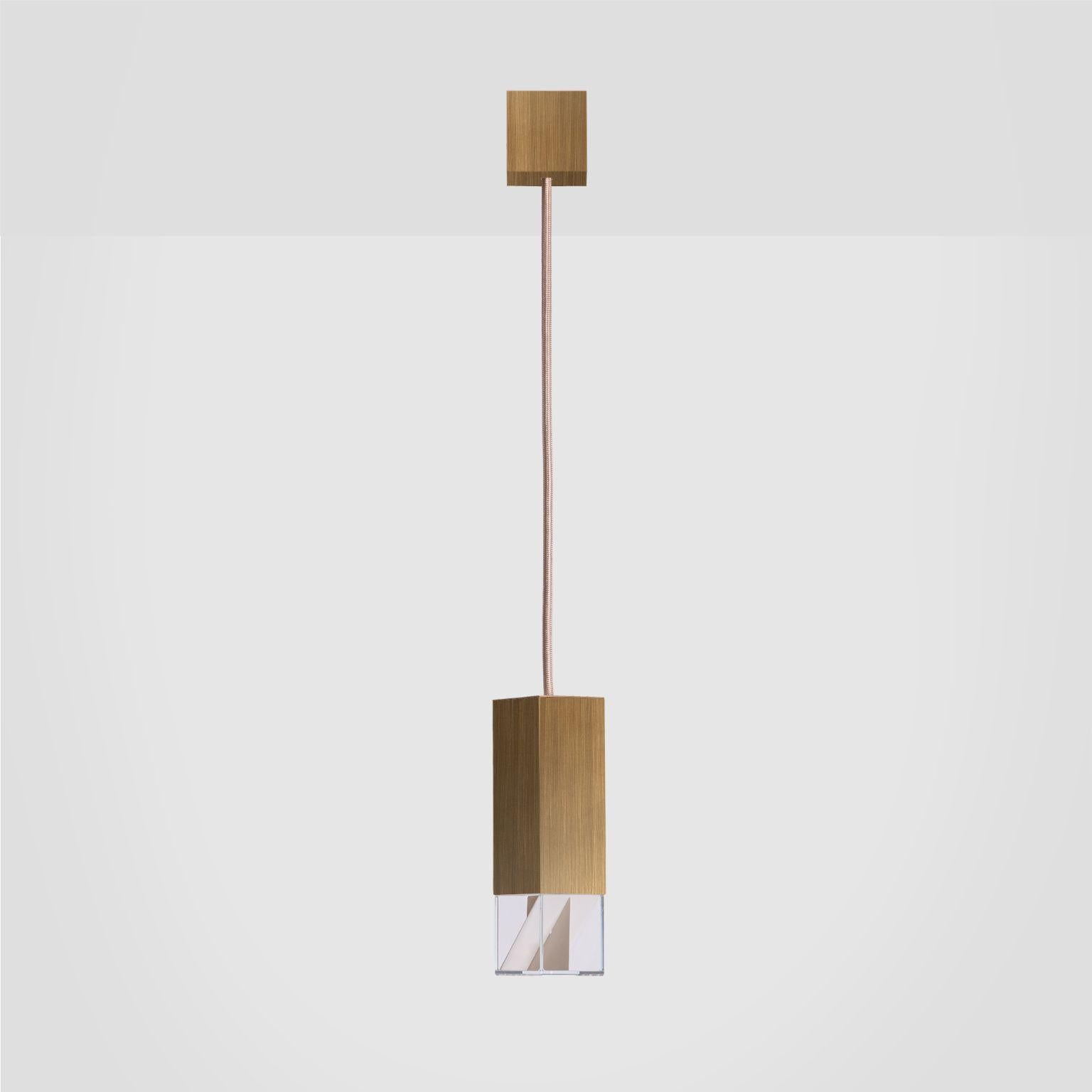 Lamp One Brass 01 Revamp Edition by Formaminima
Dimensions: D5 x W5 x H 17 cm.
Materials: Body lamp and ceiling rose: solid burnished satin brass, matt finish Crystal glass diffuser, Limoges porcelain sheets, biscuit-finish.

All our lamps can