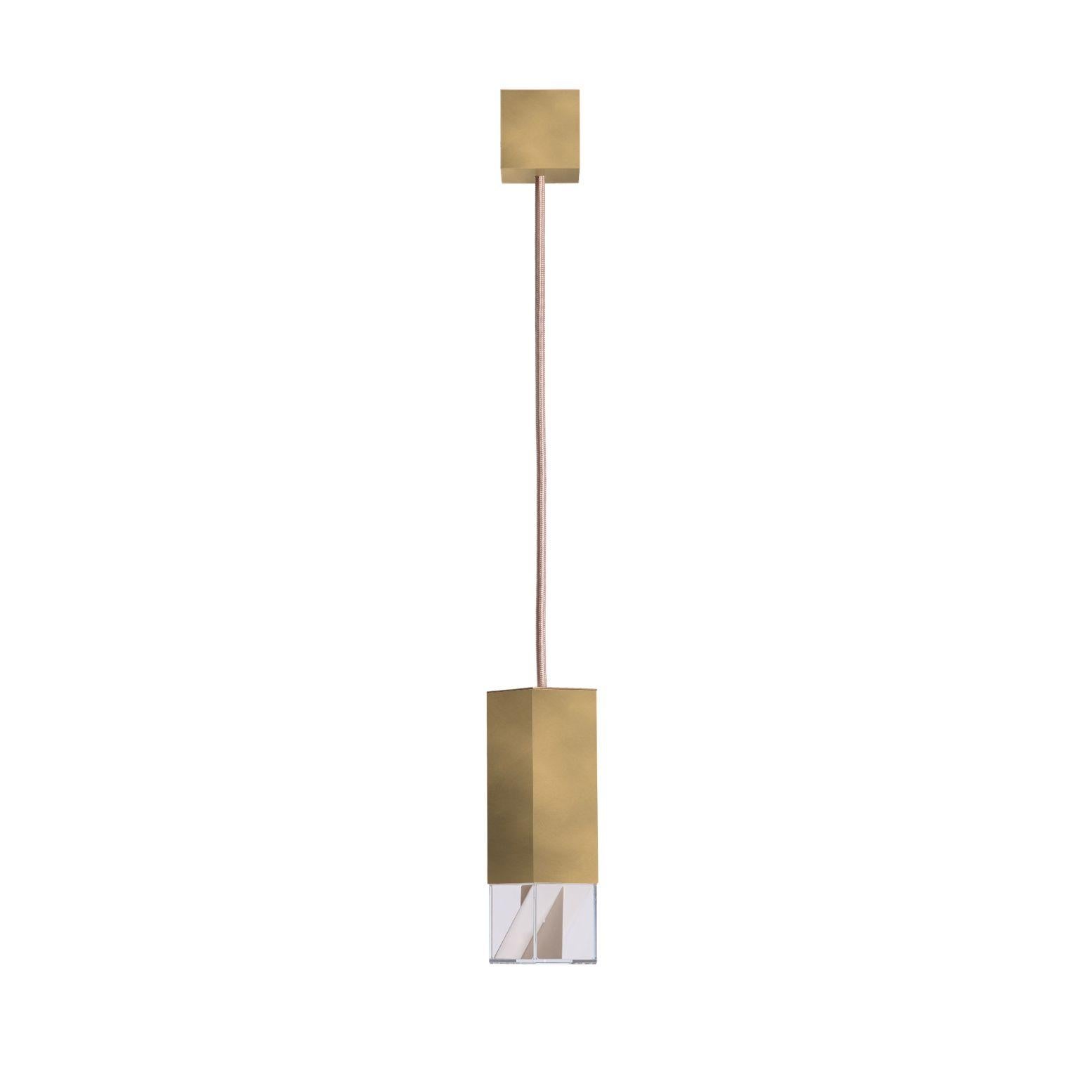 Lamp One brass 02 Revamp Edition by Formaminima
Dimensions: D5 x W5 x H 17 cm.
Materials: Body lamp and ceiling rose: solid burnished satin brass, matt finish Crystal glass diffuser, Limoges porcelain sheets, biscuit-finish.

All our lamps can