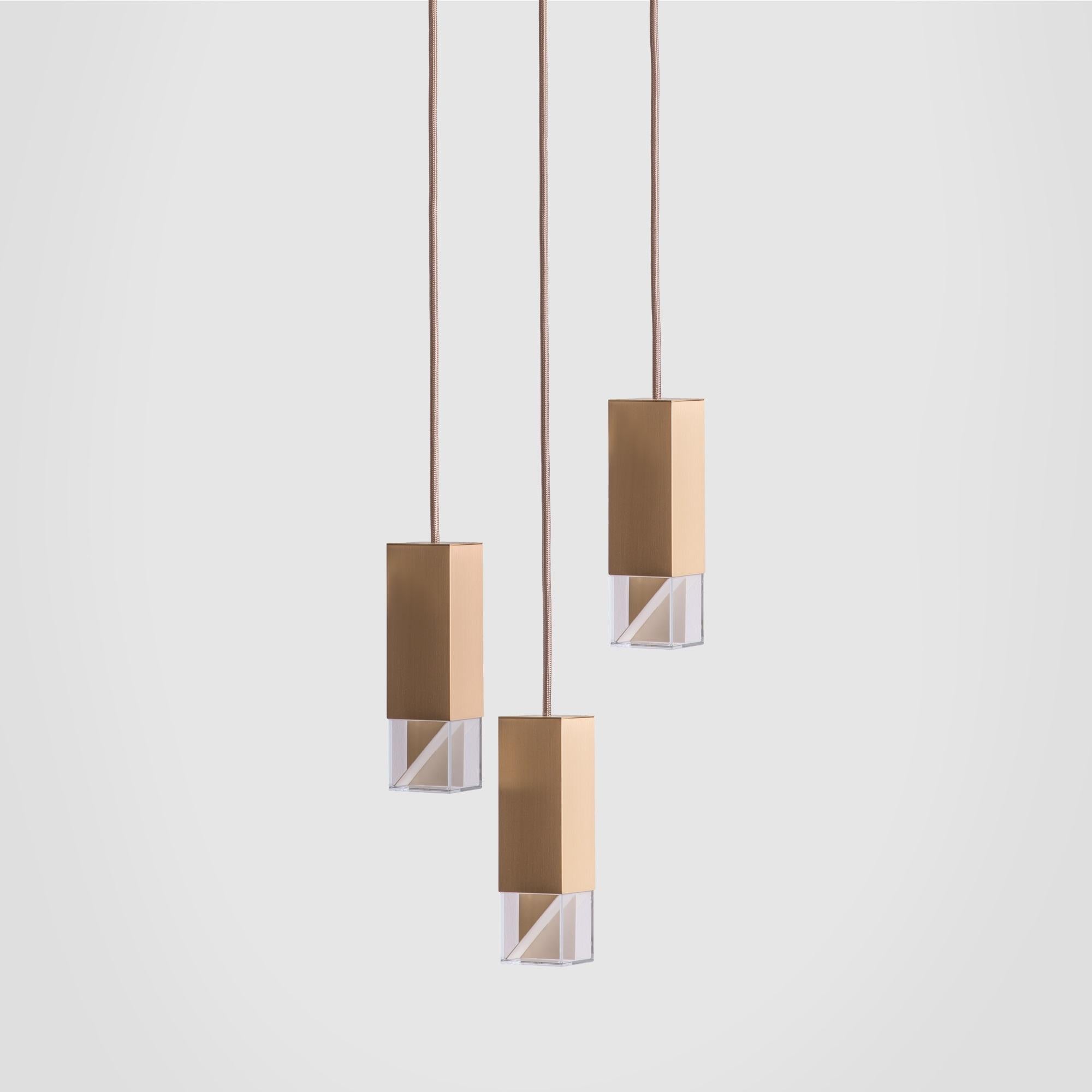 Enriching any interior with elegance, this chandelier is composed of three elements that hang at different heights with adjustable-length fabric cables (2 m max). Perfect in an entryway, above a dining table or a kitchen island, each rectangular