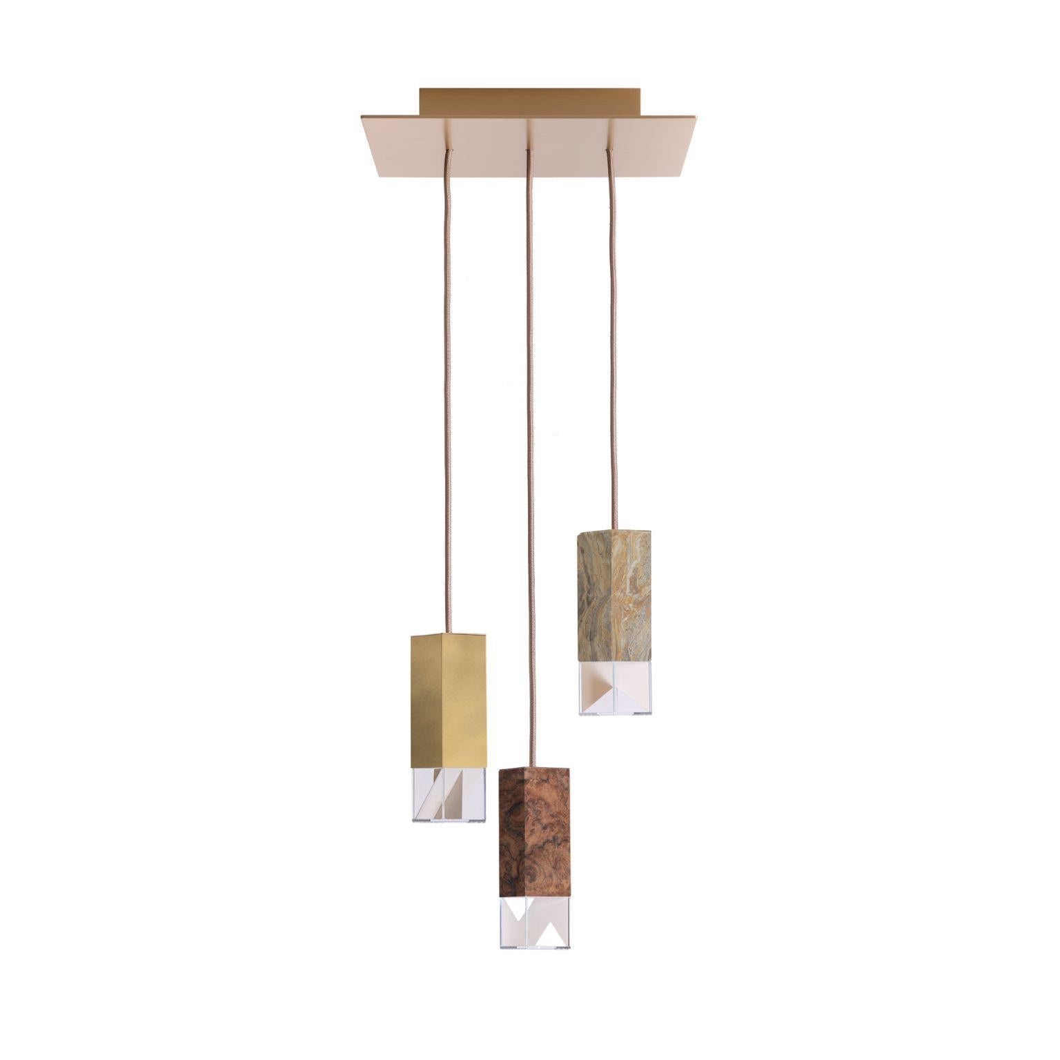 Lamp one collection chandelier 02 by Formaminima.
Dimensions: D 30 x W 30 x H 68 cm.
Materials: body lamps: handcrafted solid Arabescato Orobico grey and orange,
polished finish; solid burnished brushed brass matt satin finish; walnut briarwood,