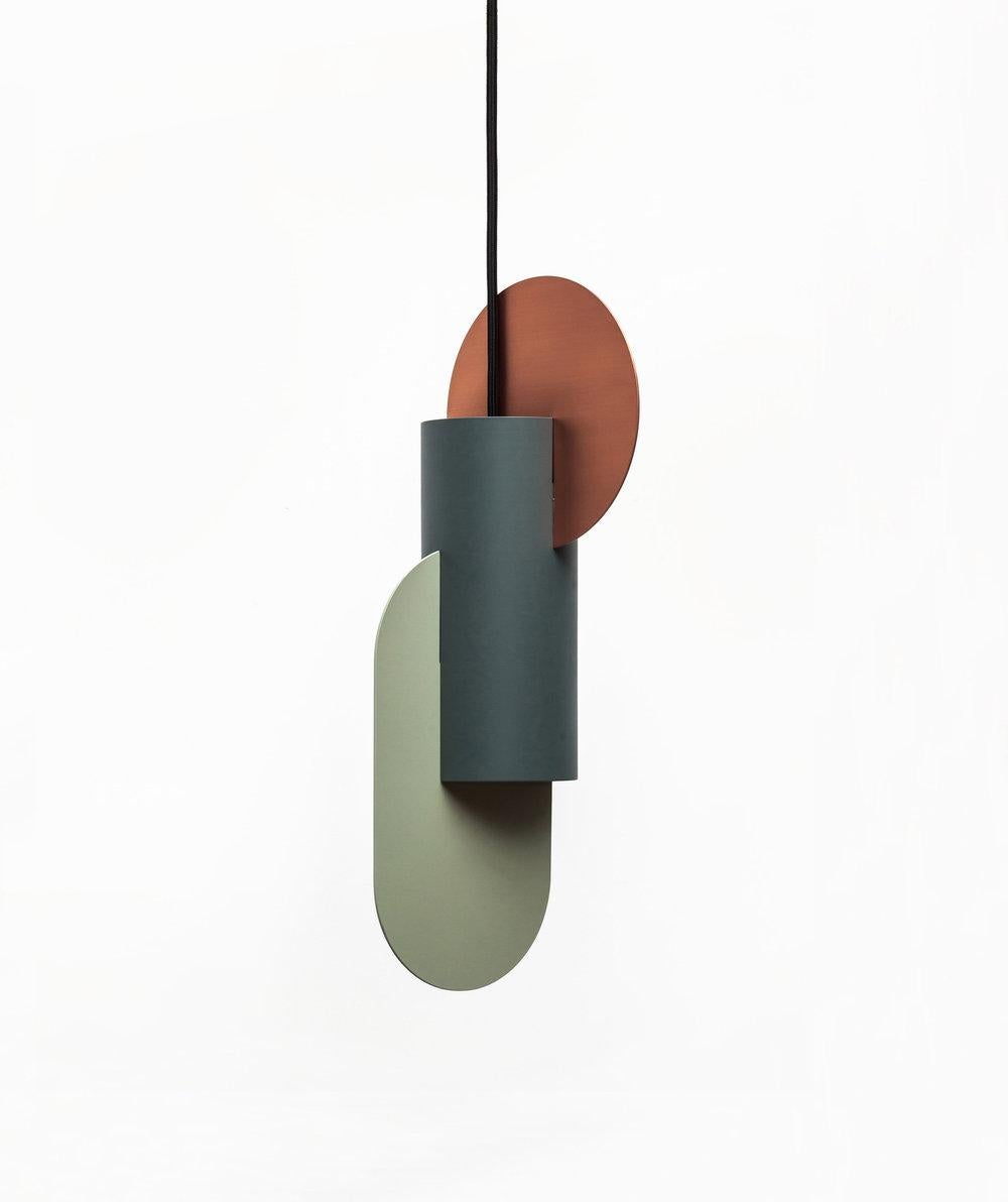 Lamp suprematic two CS1 by NOOM
Dimensions: 15 cm x 17.5 cm x H 45.5 cm
Materials: Copper, painted steel. 
Color scheme: Copper, pine green, sage green. 
Also available in other sizes.
All our lamps can be wired according to each country.