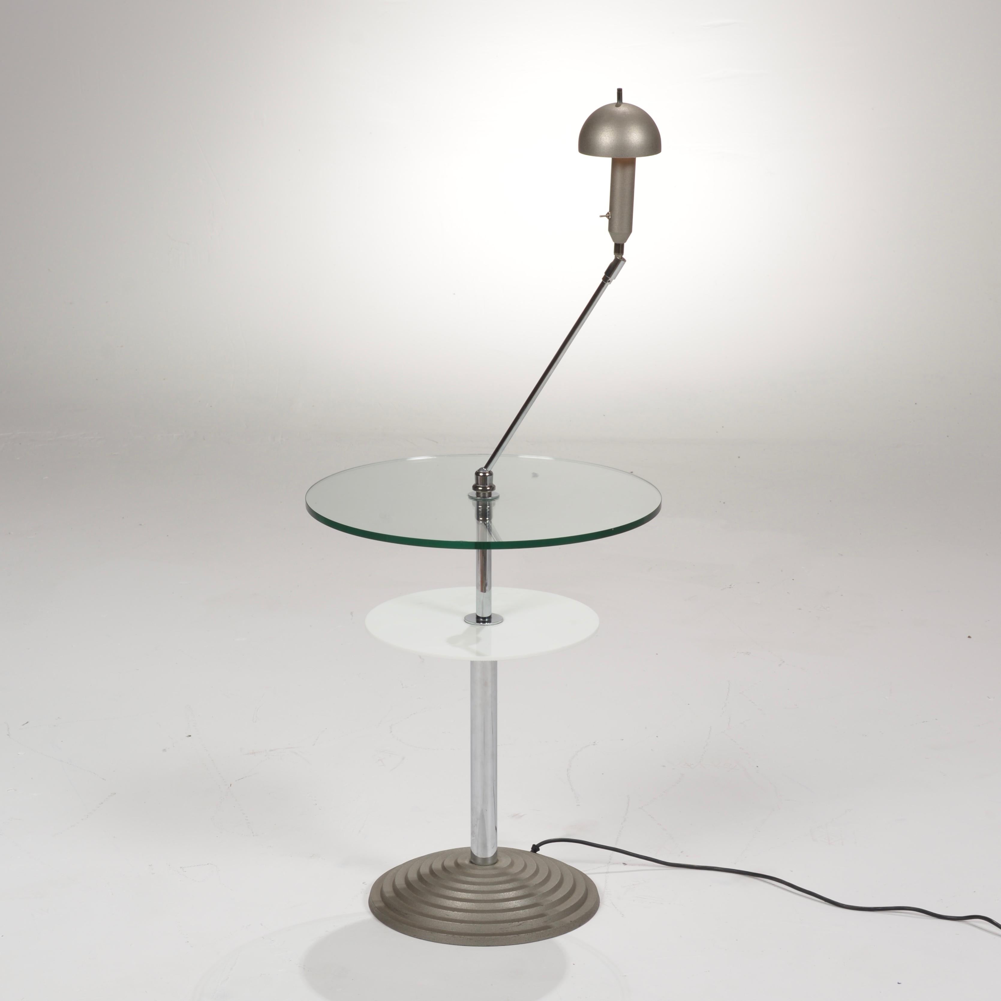 A amazing Memphis style lamp table by Daniela Puppa and Franco Raggi for Fontana Arte. Adjustable inclination stem, glass, opaline glass, metal. Model Altair 2755, Italy, 1988.

All items are viewable at our Los Angeles Arts District showroom and