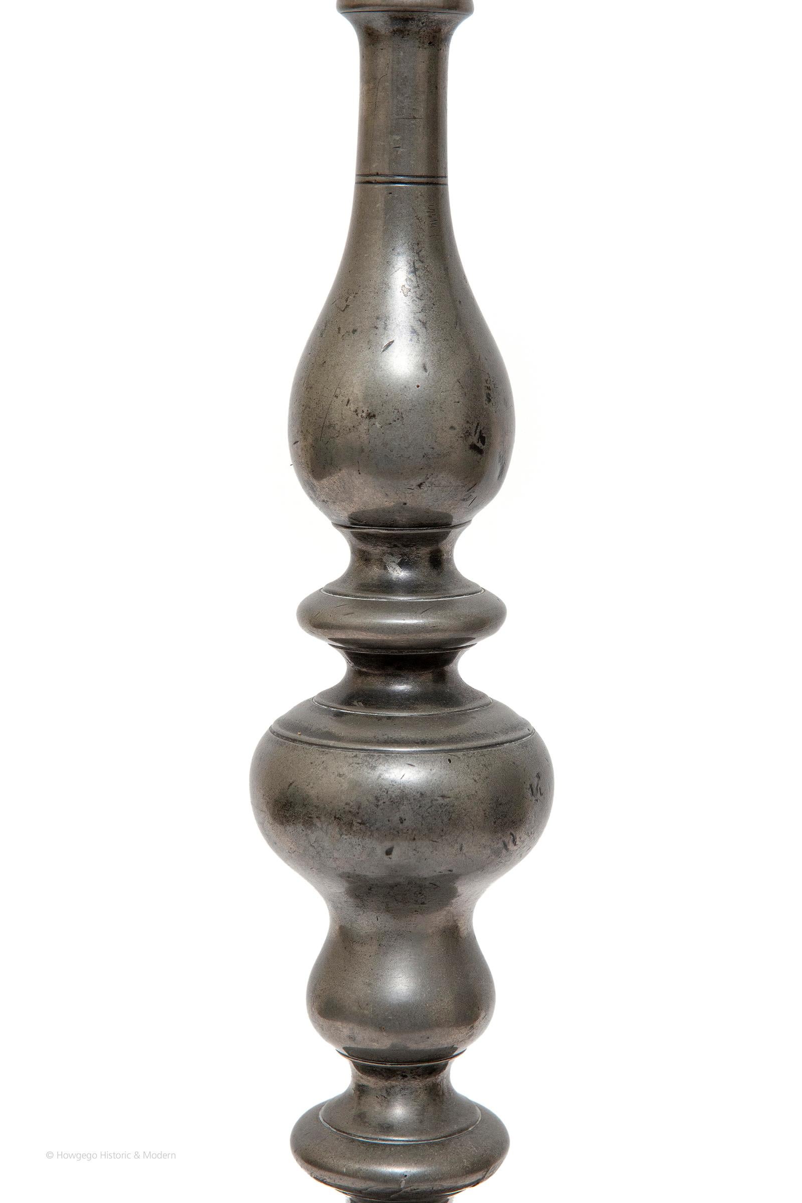 Exceptionally rare, 17th century, pewter candlestick upcycled into a table lamp, 20” high

Elegant, classical form typical of the Baroque period, with all the surfaces reflecting light 
Surviving pewter pieces from this period are rare as it is a