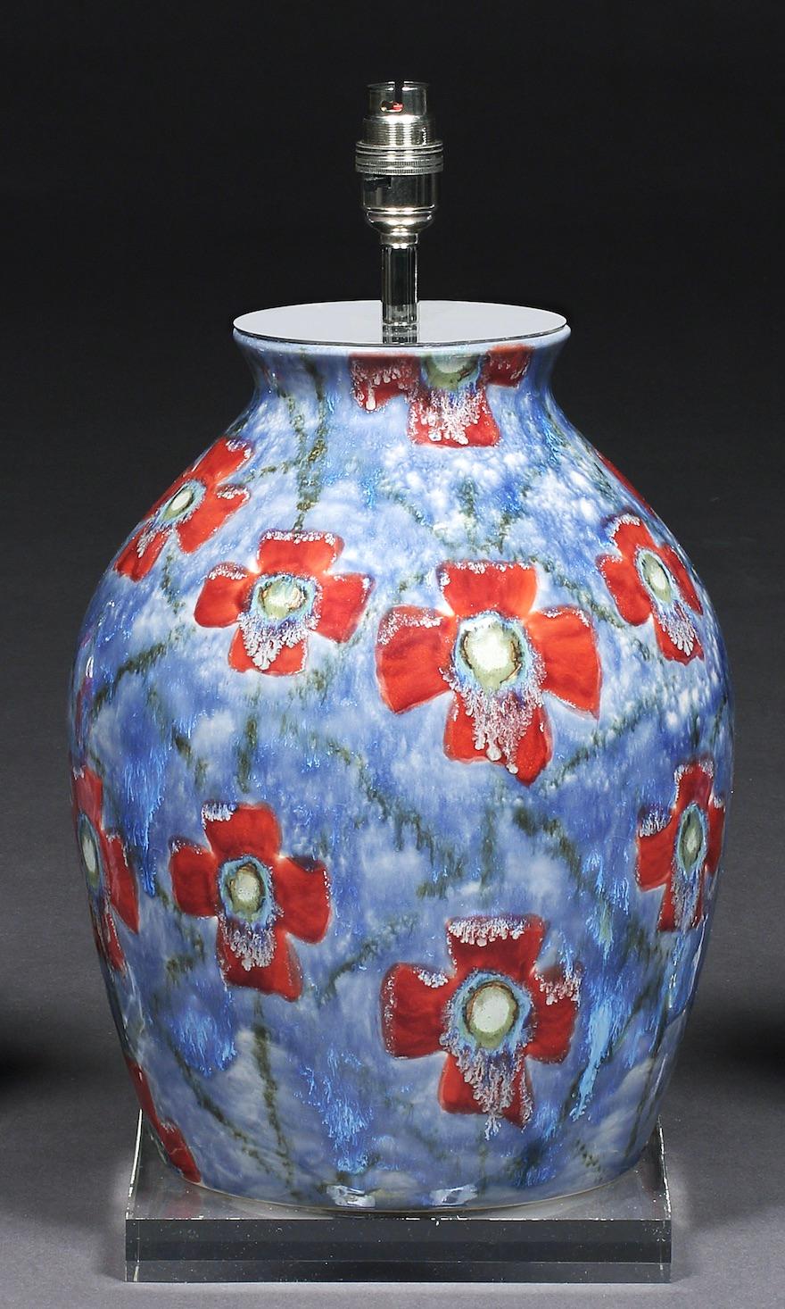 A large Cobridge, poppy and ice pattern, hand painted vase converted into a table lamp on a perspex base, 12” high
One of Cobridge Pottery’s most popular patterns, designed by artist Anita Harris, leading designer at Cobridge, Moorcroft & her own