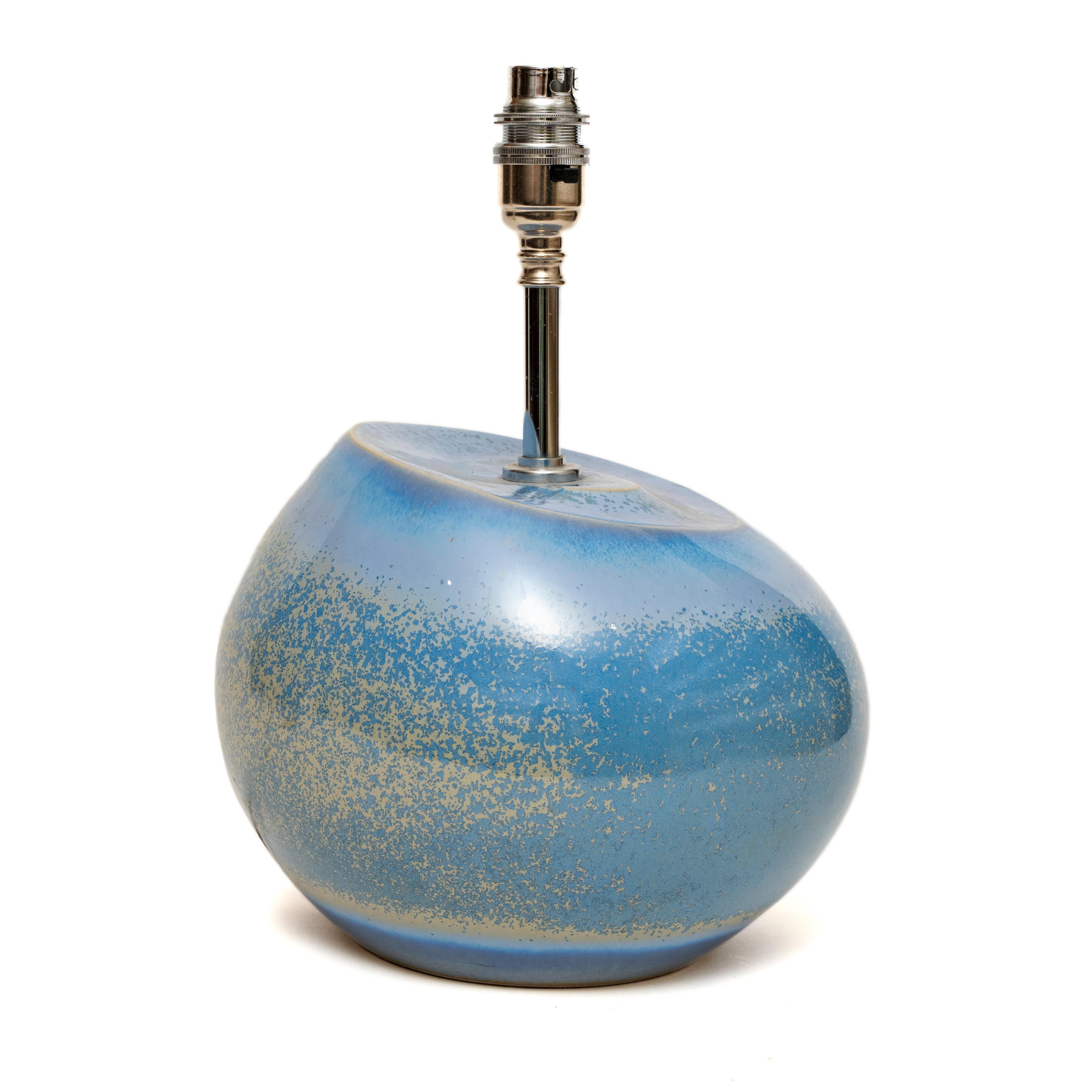 Cobridge stoneware: Modernist blue table lamp, 29cm., 11½” high
Modernist table lamp, the graduating curved levels of the top creates unusual form and softness in the bulbous body
Of interest to Cobridge collectors
Cobridge stoneware modernist