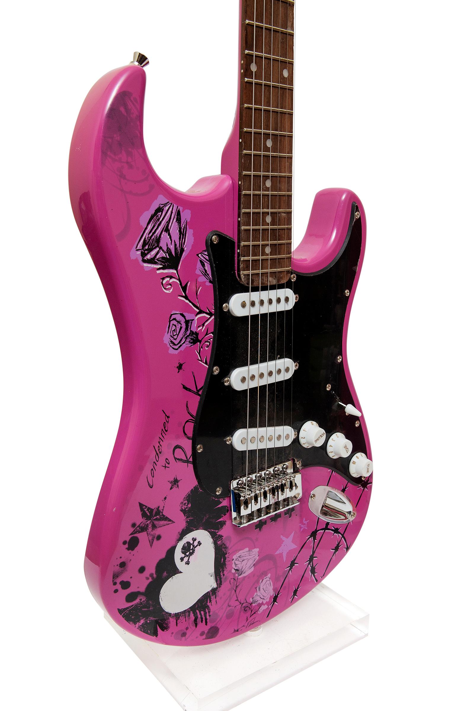 Vintage, rock and roll or punk enthusiasts lamp or guitar that can easily be strummed or played. Upcycled from a vintage purple punk kick-ass guitar for the discerning rock chick. Oozing attitude and style, this guitar exudes personality from every