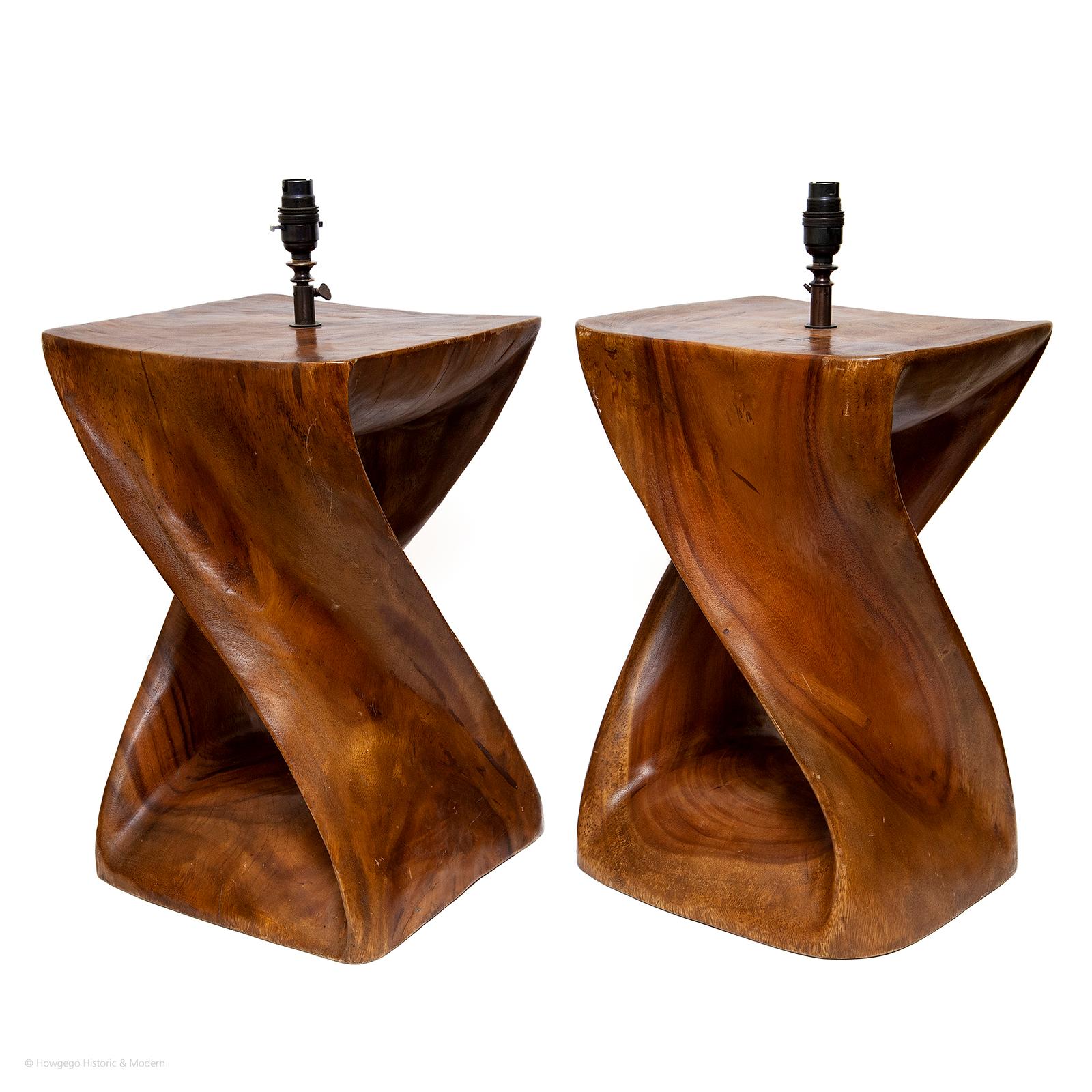 RARE PAIR OF VINTAGE, HARDWOOD SCULPTURES UPCYCLED INTO TABLE LAMPS, 21” HIGH
Naturalistic with fluid form
Carved from one block
The sides delicately fold into each other appearing flexible and  fluid and showing the fine figuring of the