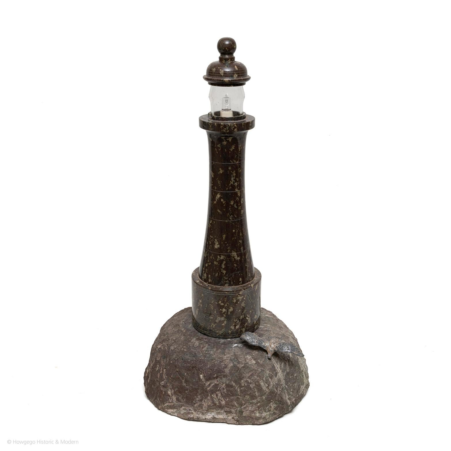 Appealing to the nautical or seaside enthusiast
Characterful table lamp bringing the spirit of the sea into the interior, would be atmospheric in a seaside home.

A large Cornish turned serpentine granite lighthouse lamp made from local stone.
