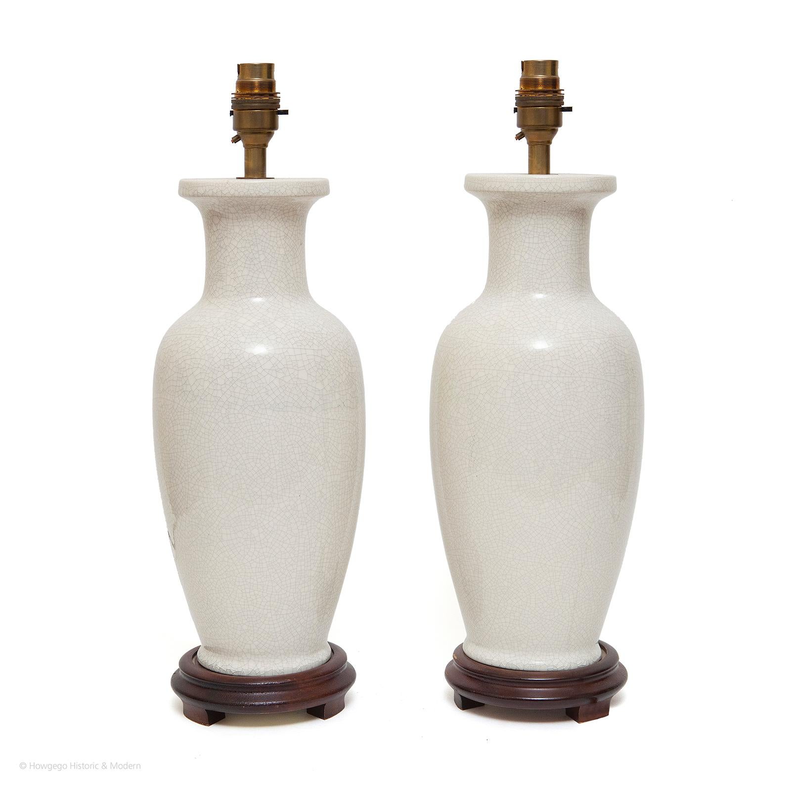 Pair of vintage, white, porcelain vase, table lamps, 17½” high
air of vintage, white, porcelain vase, table lamps, 17½” highWhite is not a neutral colour: it forces other colours to reveal themselves. Its blankness suggests both beginnings and