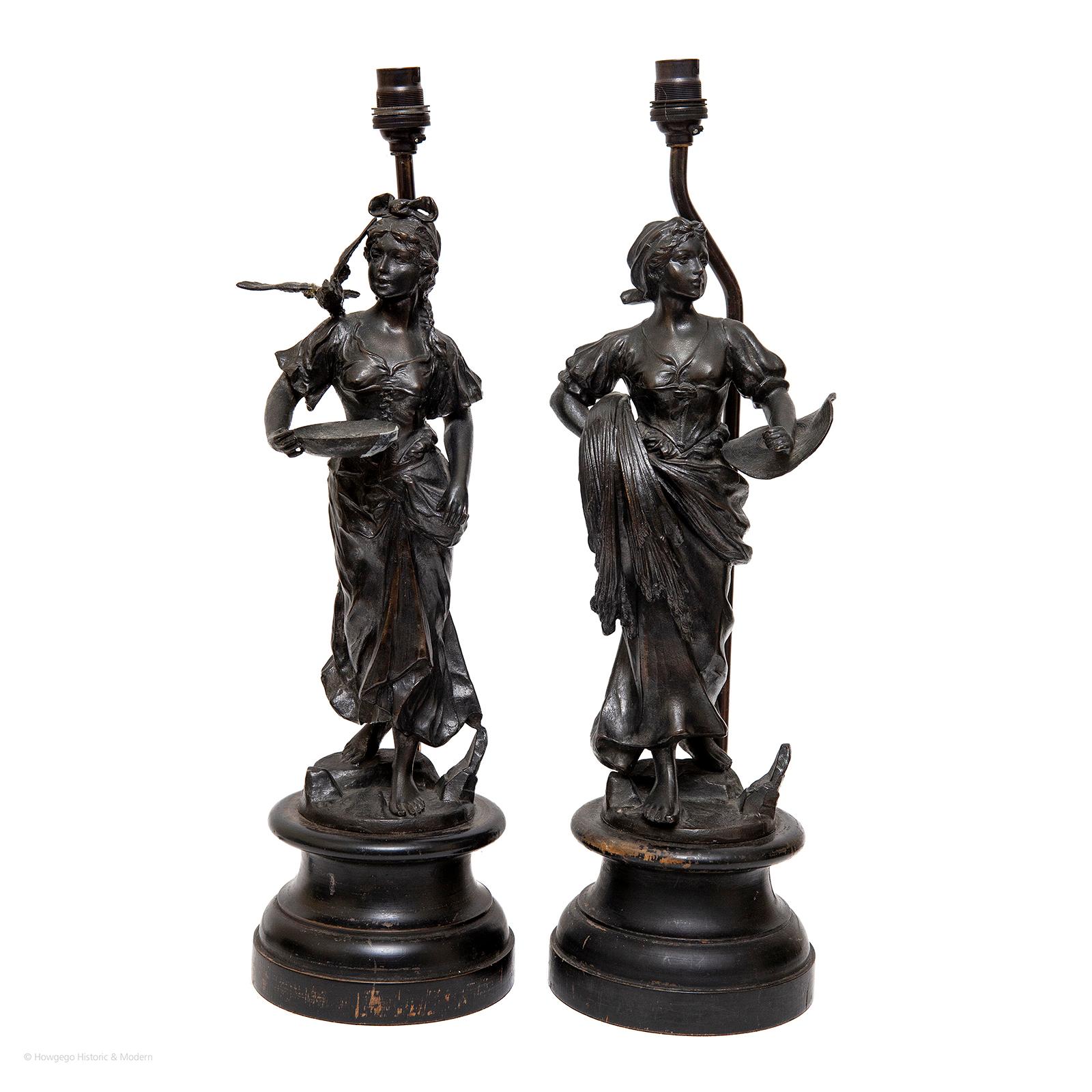 A fine pair of 19th century, spelter, dark bronzed, shepherdesses in the pastoral and romantic styles upcycled into 21” high table lamps

These fine sculptures introduce a classically inspired pastoral atmosphere and charm into the interior
The