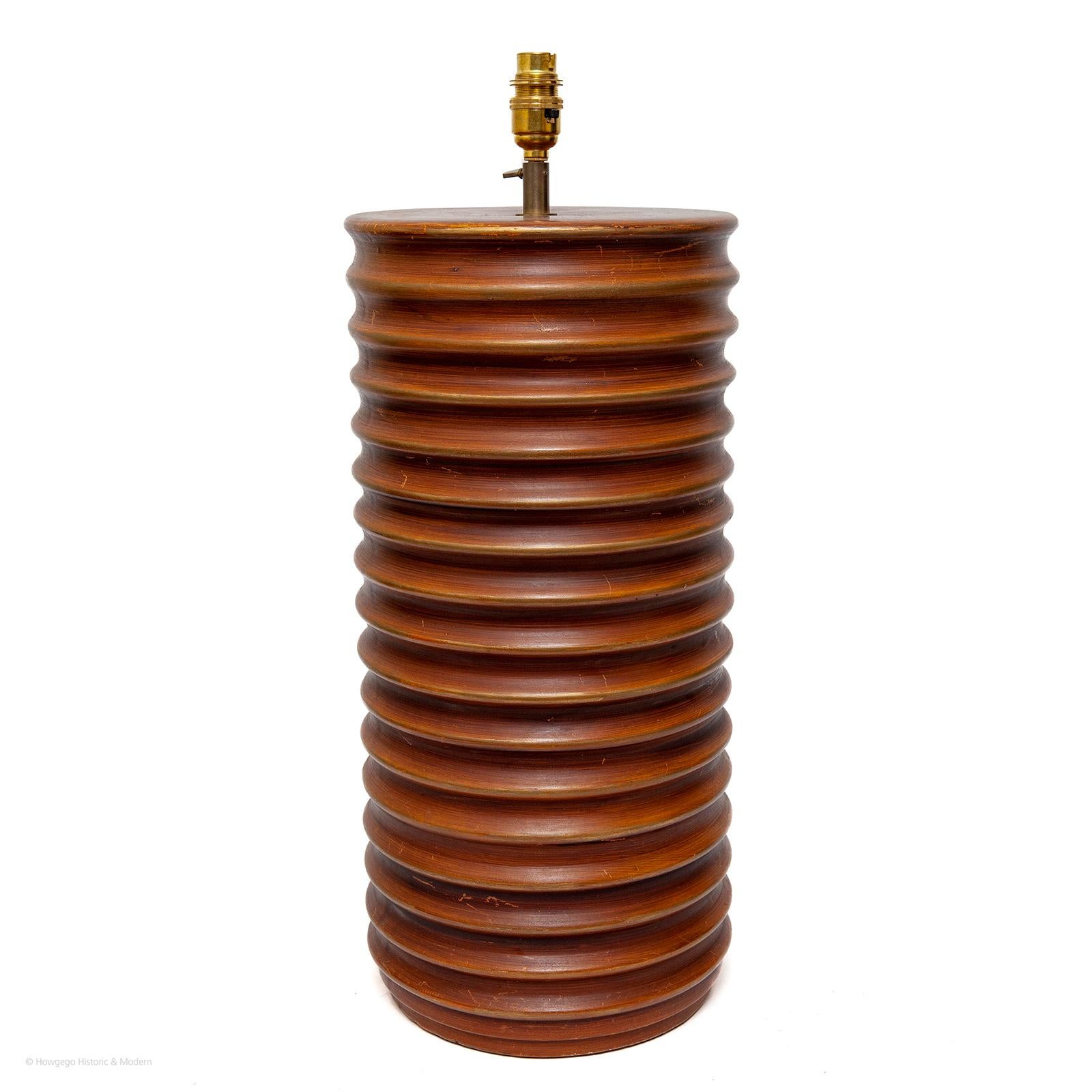 Vintage, Spanish, ring turned, pottery table lamp with a red ochre, earth tone glaze, 19½ high

Bold and elegant with a naturalistic, earth aesthetic. 
The conversion is recent so it conforms to UK PAT Electrical standards.
Pricing £
