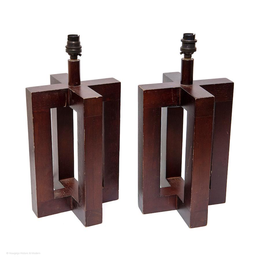 Pair of vintage, teak, table lamps, 15” high, inspired by the form of Jean Michel Frank’s 1928, croisillon lamp
Classic form with exquisite proportion and spaciousness blending with any style.
Injecting classic elegance into the interior.
The