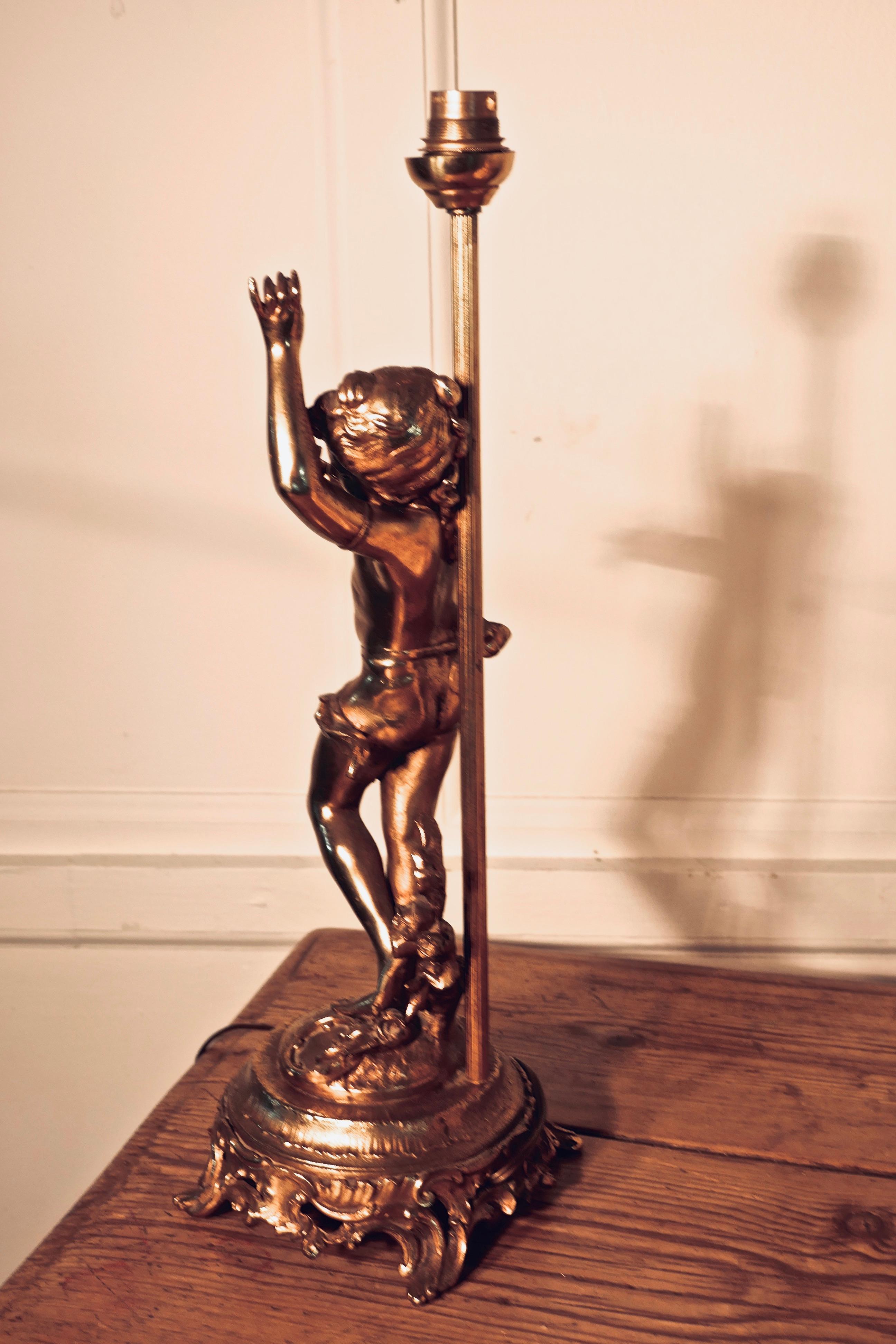 Art Deco Lamp with a Dancing Cherub or French Brass Musician    For Sale