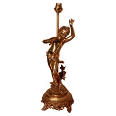 Antique Lamp with a Dancing Cherub or French Brass Musician   