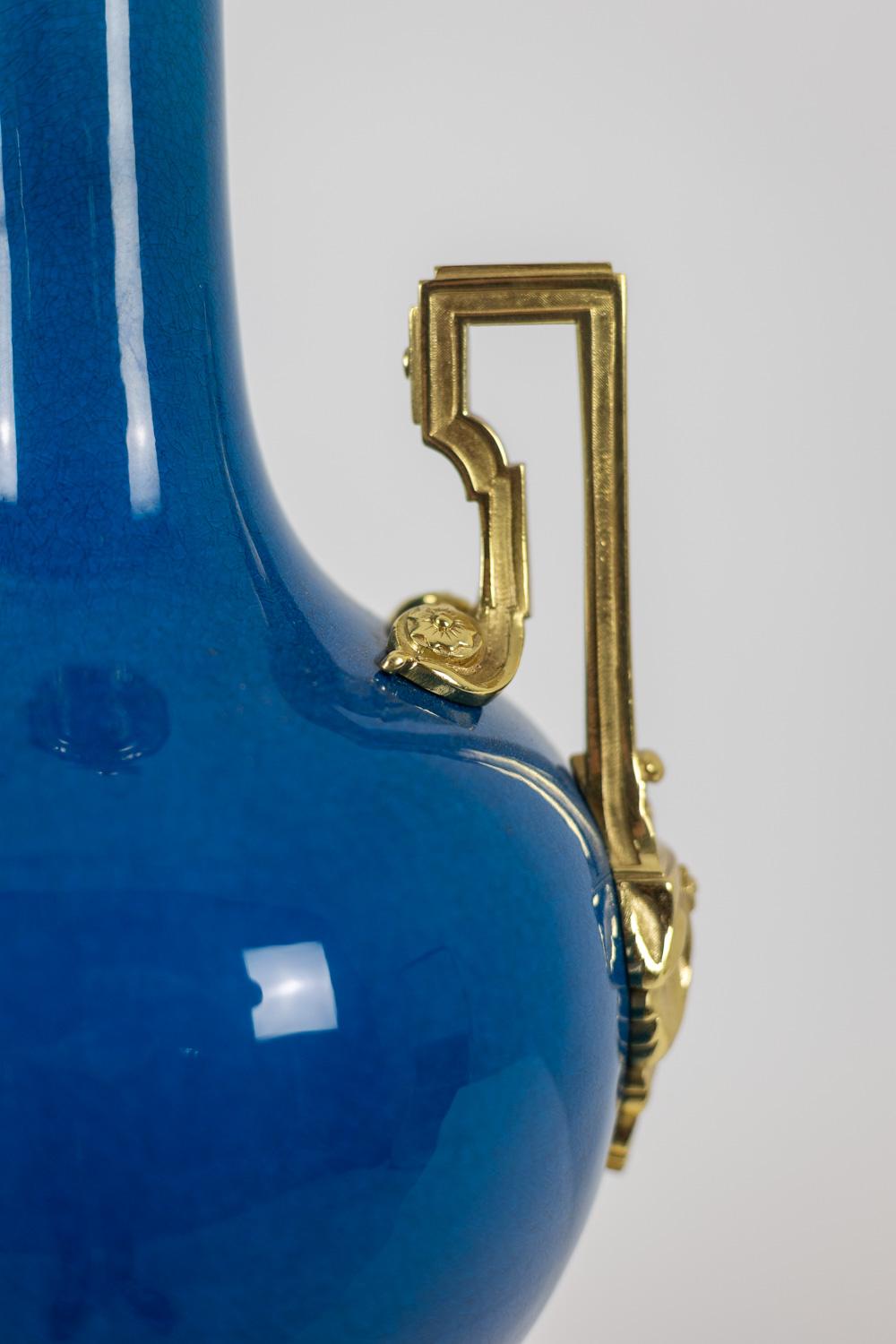 French Lamp with blue porcelain and gilded bronze handles. Circa 1880. For Sale