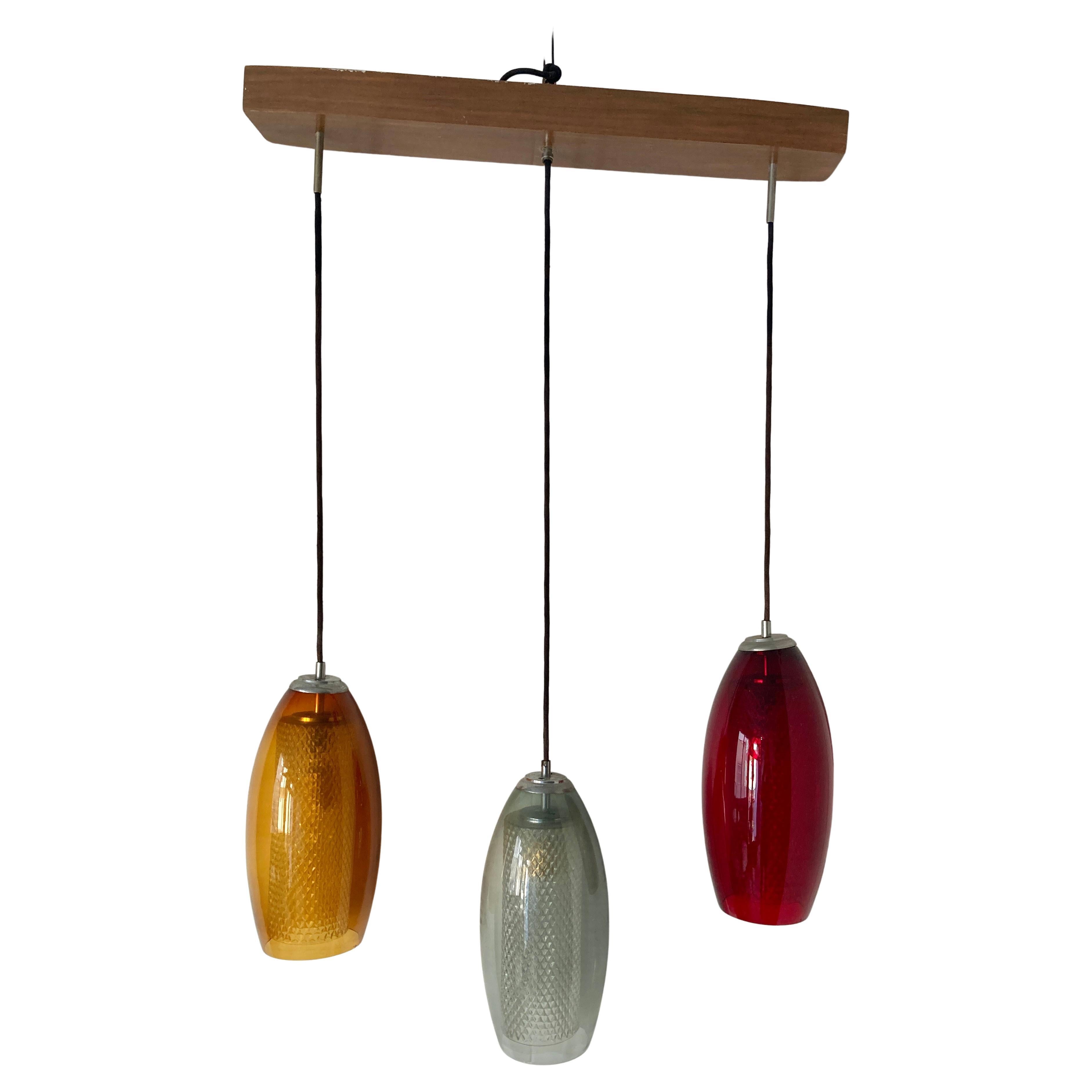 Lampada con tre globi di vetro colorati in vendita