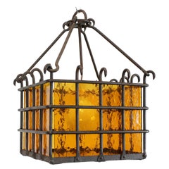 Lamp with wrought iron frame and textured amber glass diffusers - c. 1970 -
