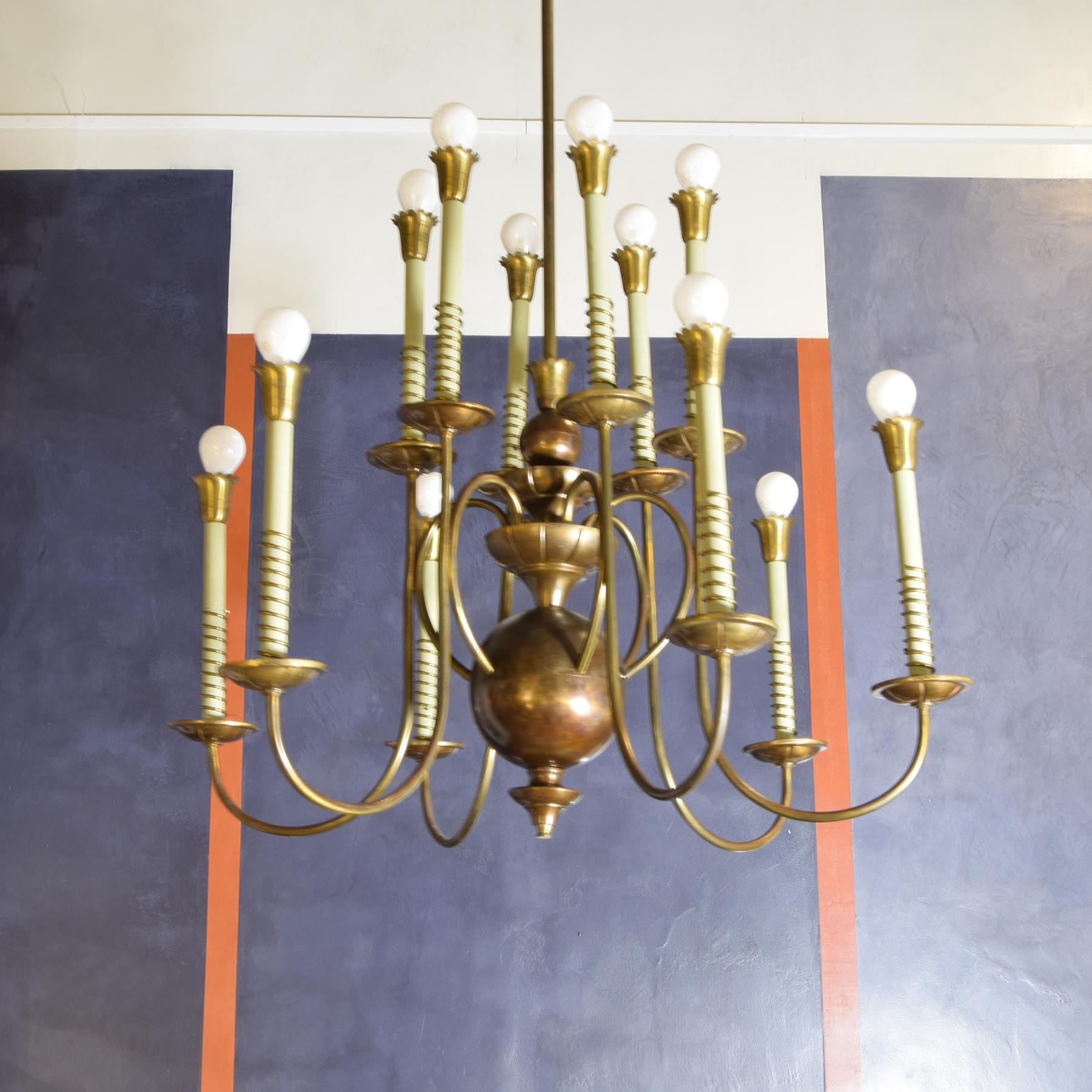 Lampadari a sospensione in ottone a dodici luci luci produzione italiana  anni 50