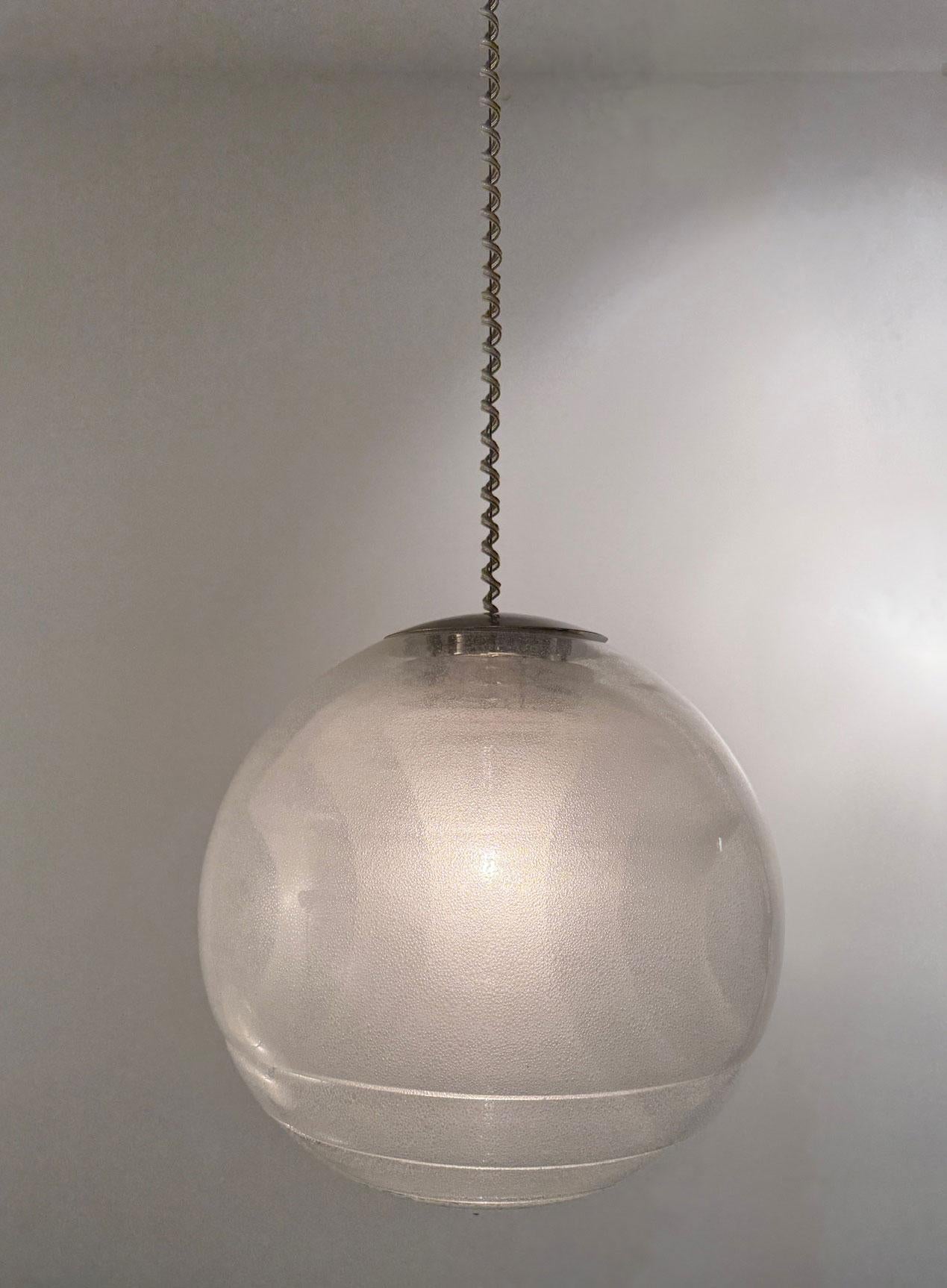 LS 177 hanging lamp with large pulegoso Murano glass sphere, designed by Carlo Nason for A.V. Mazzega, Italy. Year 1970 ca. 
Carlo Nason (b. 1935, Murano, Venice) is an Italian designer and master glassmaker, known for his Murano glass works and for