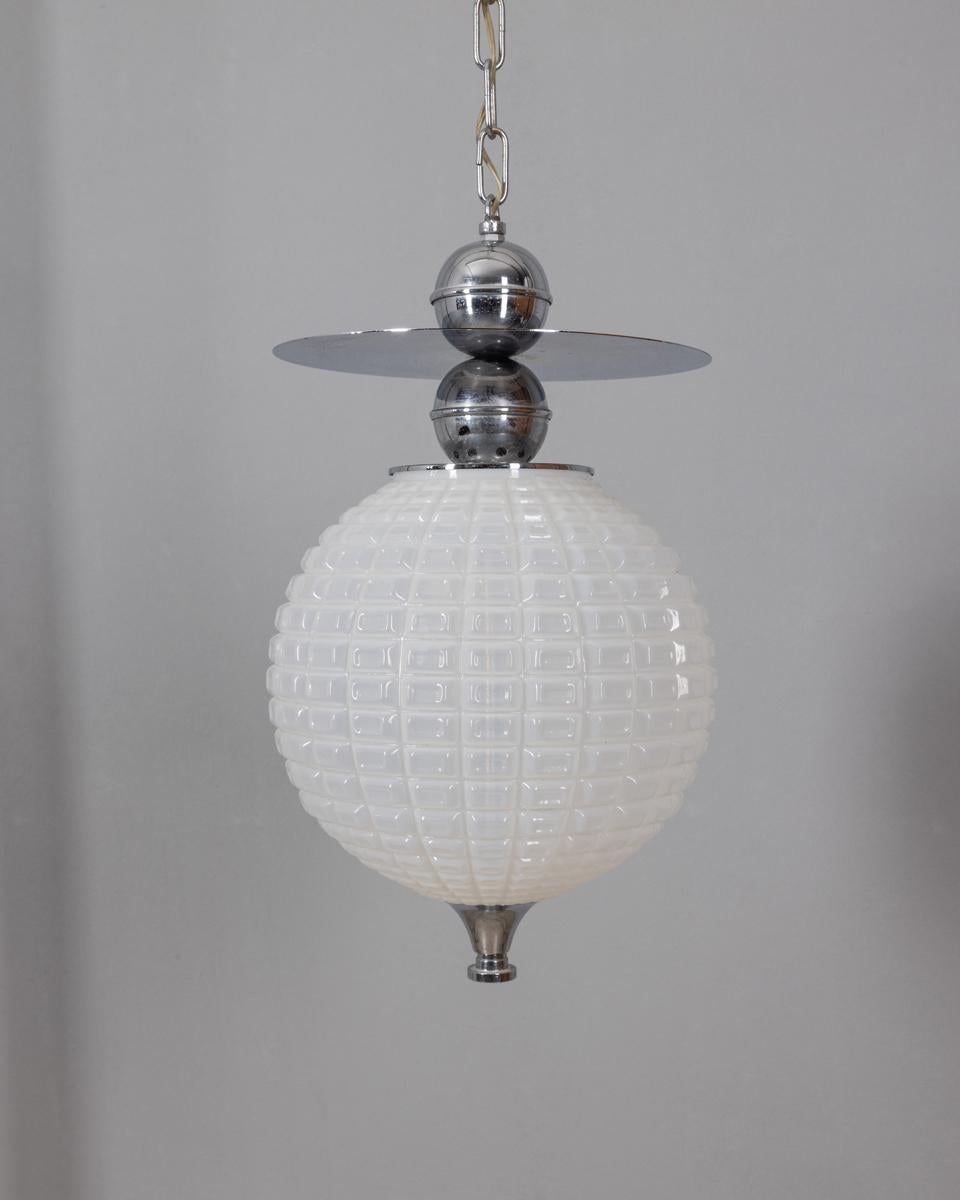 Suspension lamp with chrome metal frame, spherical white glass shade, Italian design, 1970s.

CONDITION:
In good, working condition, may show signs of wear given by time.

SIZING: 
Height 110 cm; Diameter 27 cm

MATERIALS: 
Metal and glass

YEAR