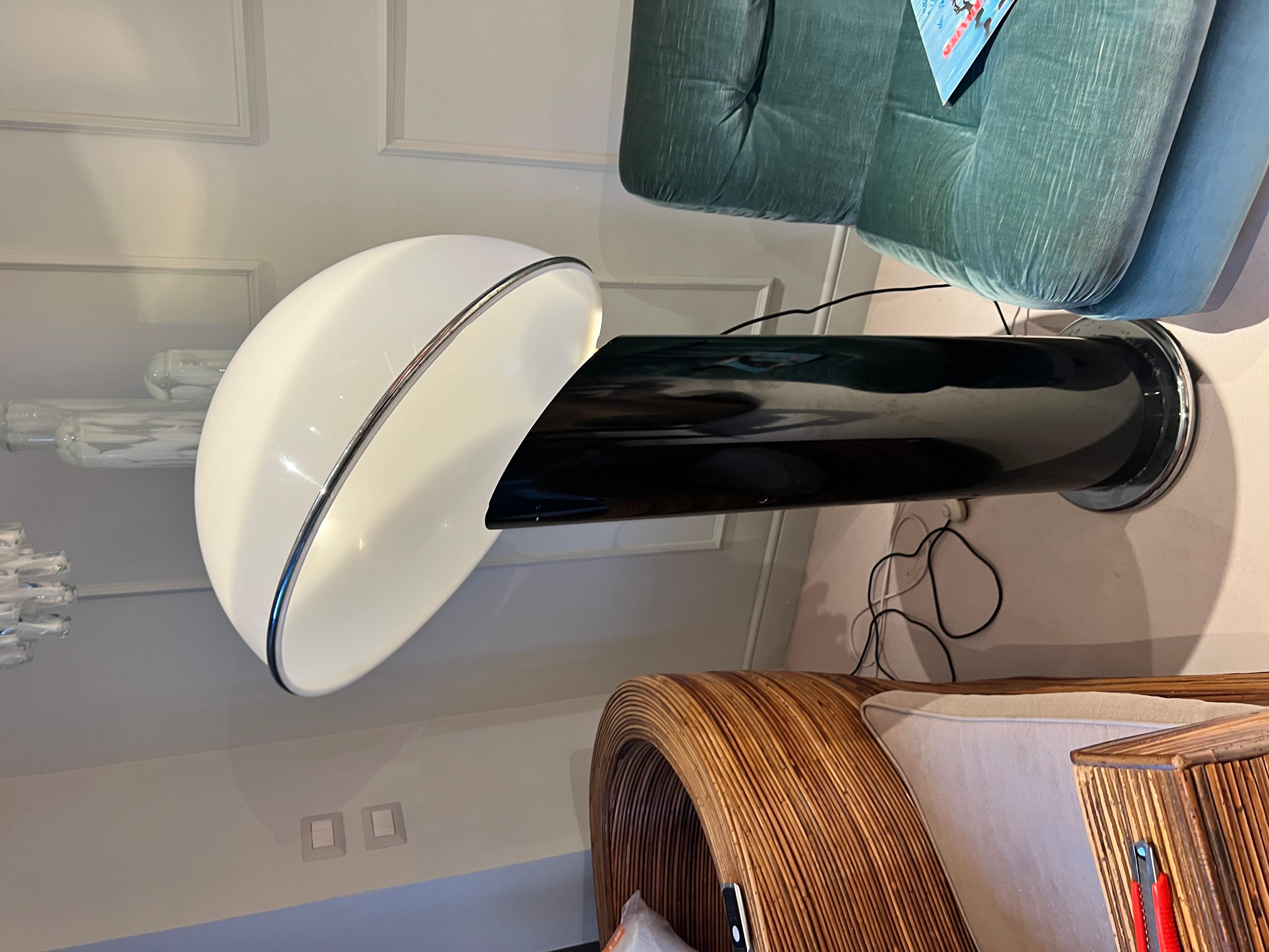 ciot model by Italian designer Ennio Chiggio for production editor Lumenform. Black resin and chrome metal base, white Lucite methacrylic lampshade. Famous design such as Stilnovo, Joe Colombo, Arteluce, Arredoluce, Lumi, Luci, Rggiani, Sciolari,