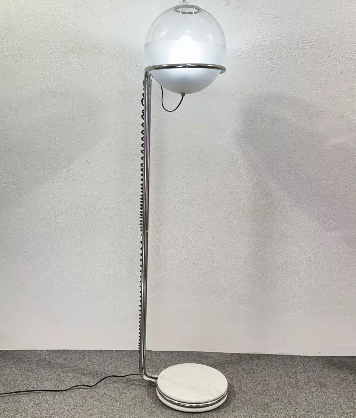 Very rare Floor Lamp Fabio Lenci Style 1960's Design Modernariato.

Chromed steel frame, Marble double disc base, satin/transparent glass swivel diffuser with chromed steel profile.

The item is in good conservative condition, there are no major